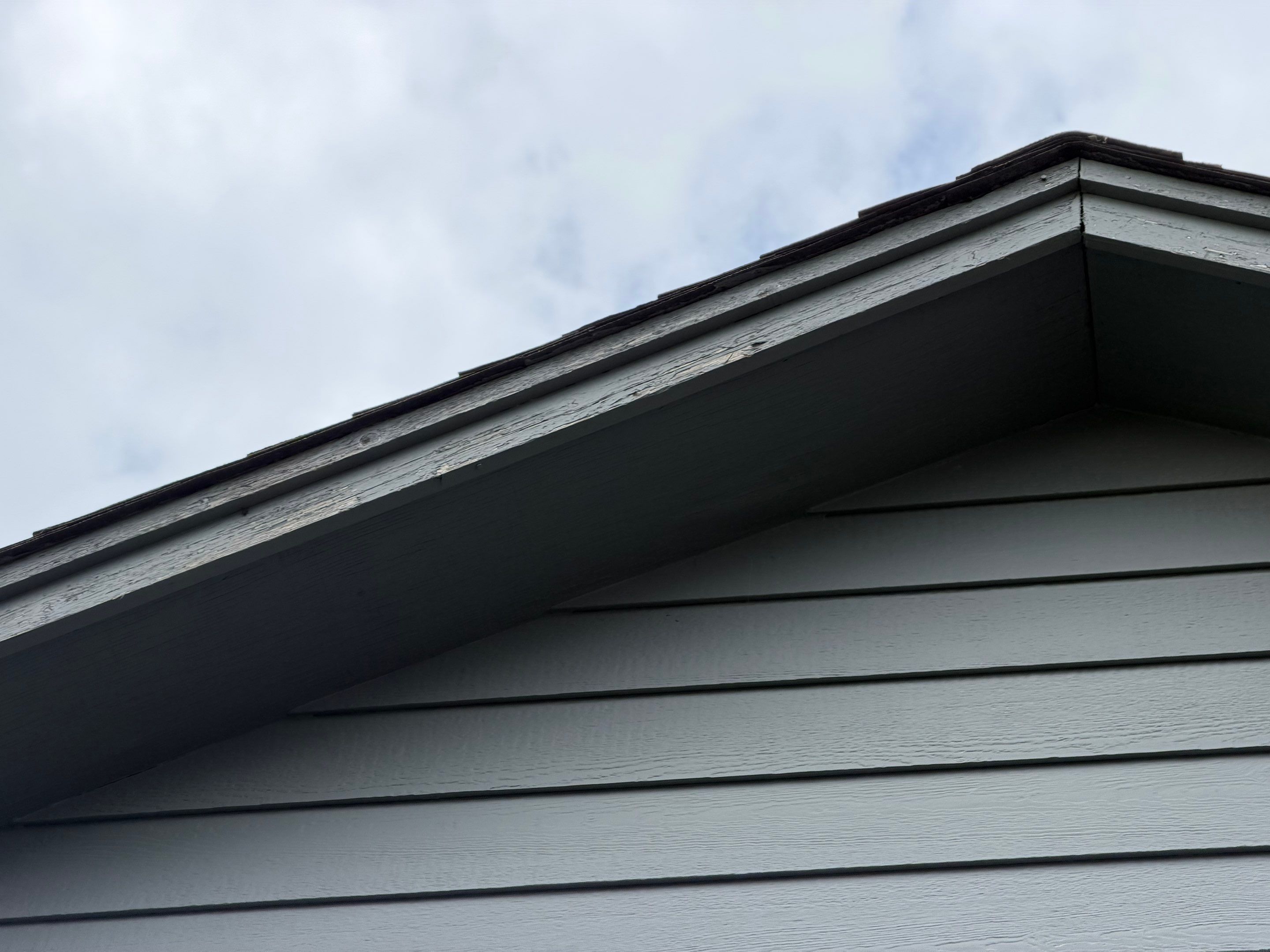 Full Exterior Painting for Gray Siding and Trim in Sioux Falls by Select Painting, Coatings & Garage Cabinets