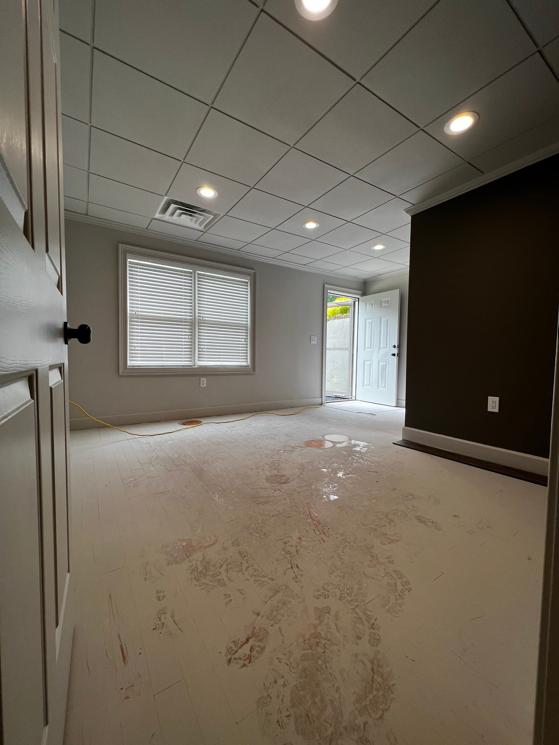 Finished Basement Renovation Featuring Home Theater and Custom Wine Cellar by Swift Home Renovations