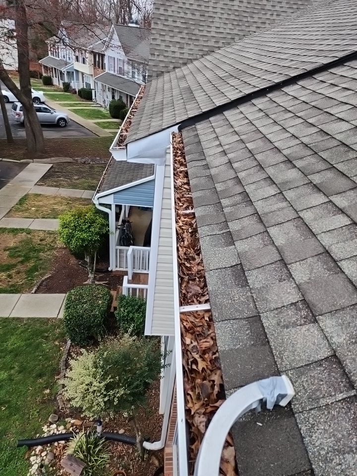 Gutter Cleaning using water by Power Wash Masters LLC