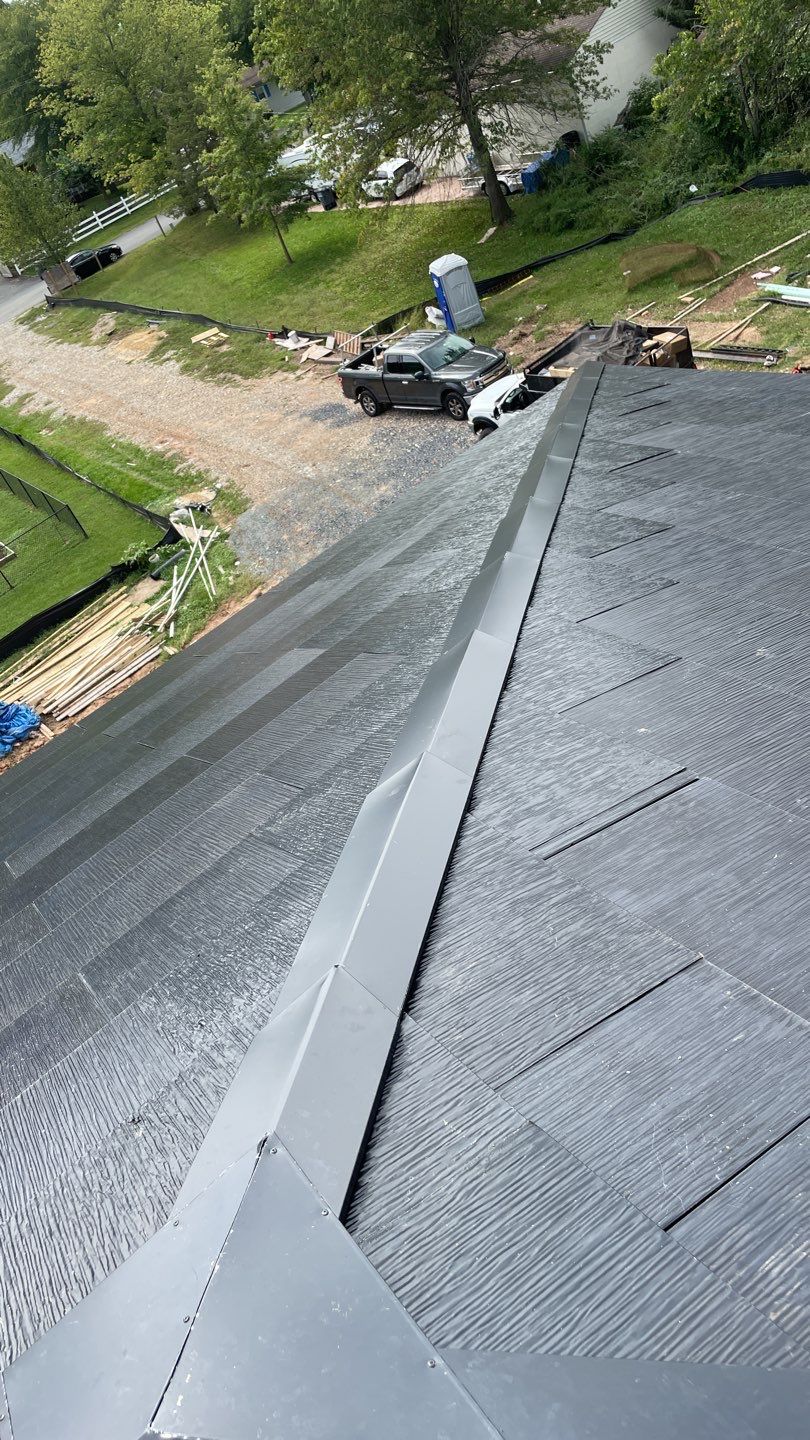 Tesla Solar Roof  using Tesla Solar Roof V3 tiles by American Home Contractors
