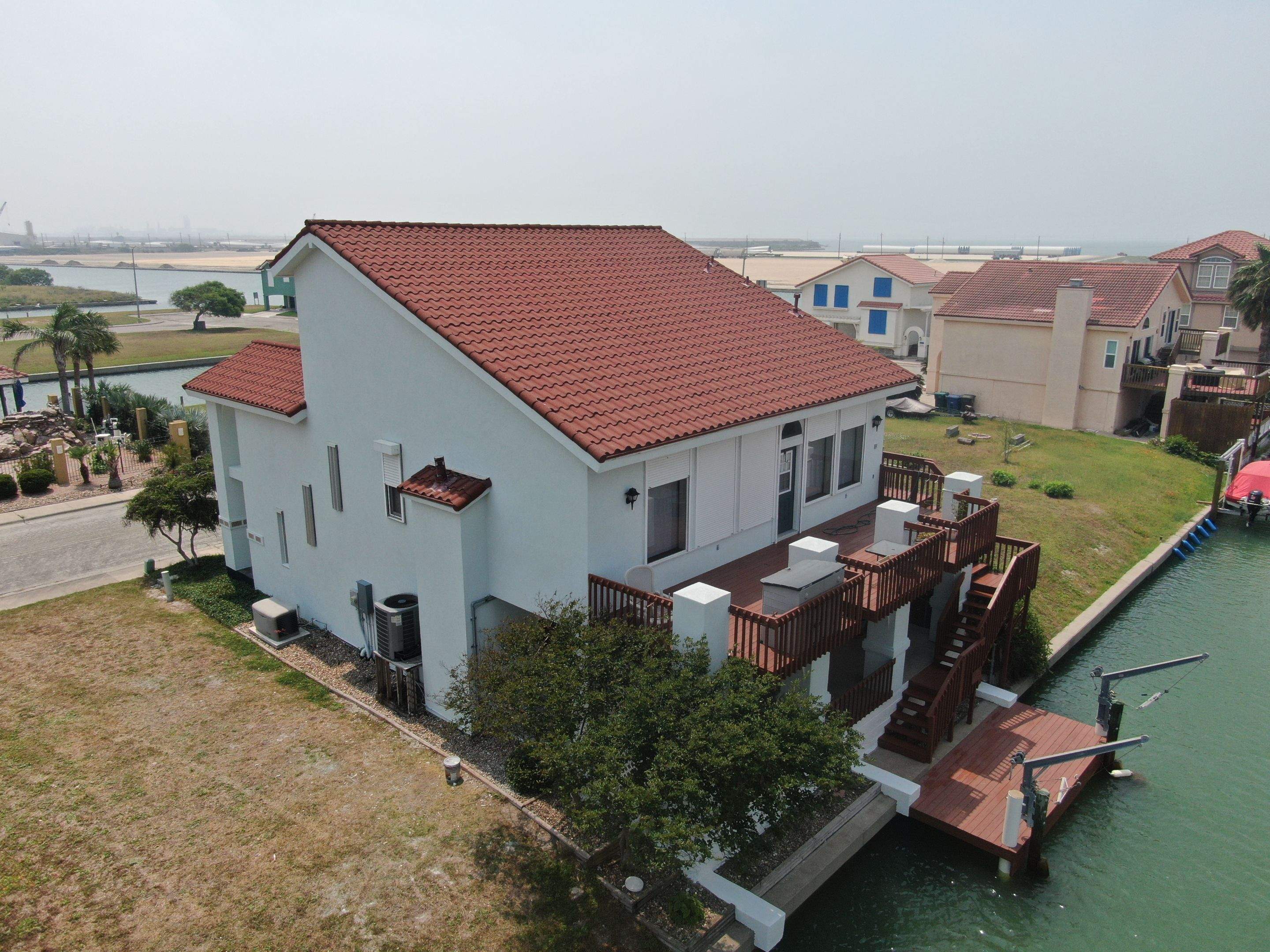 Waterfront Stucco Remastered by Bayfront Roofing and Construction