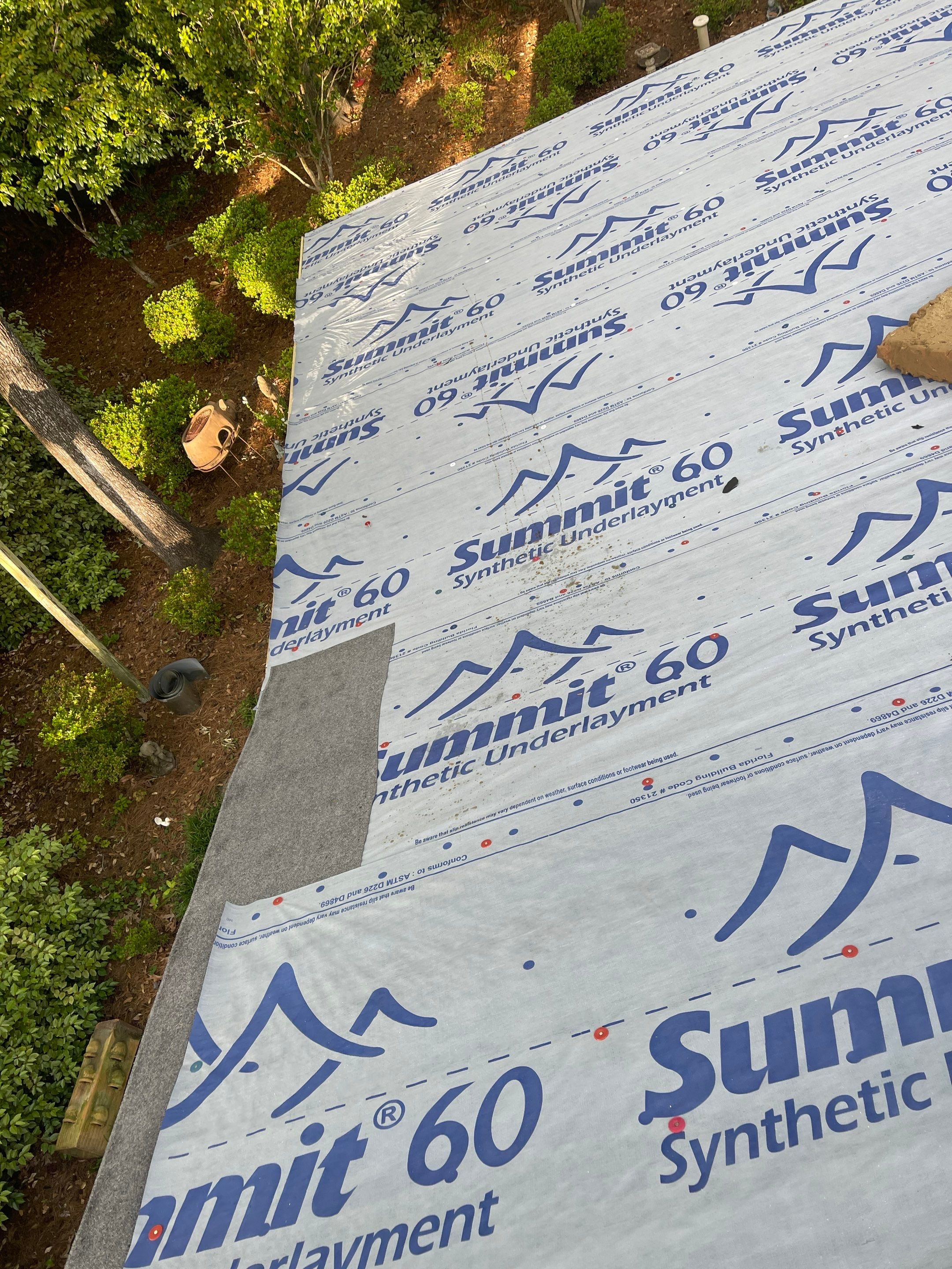 Hail Damage using Atlas Pristine Pinnacle Shingles by Artigues Roofing & Restoration Services