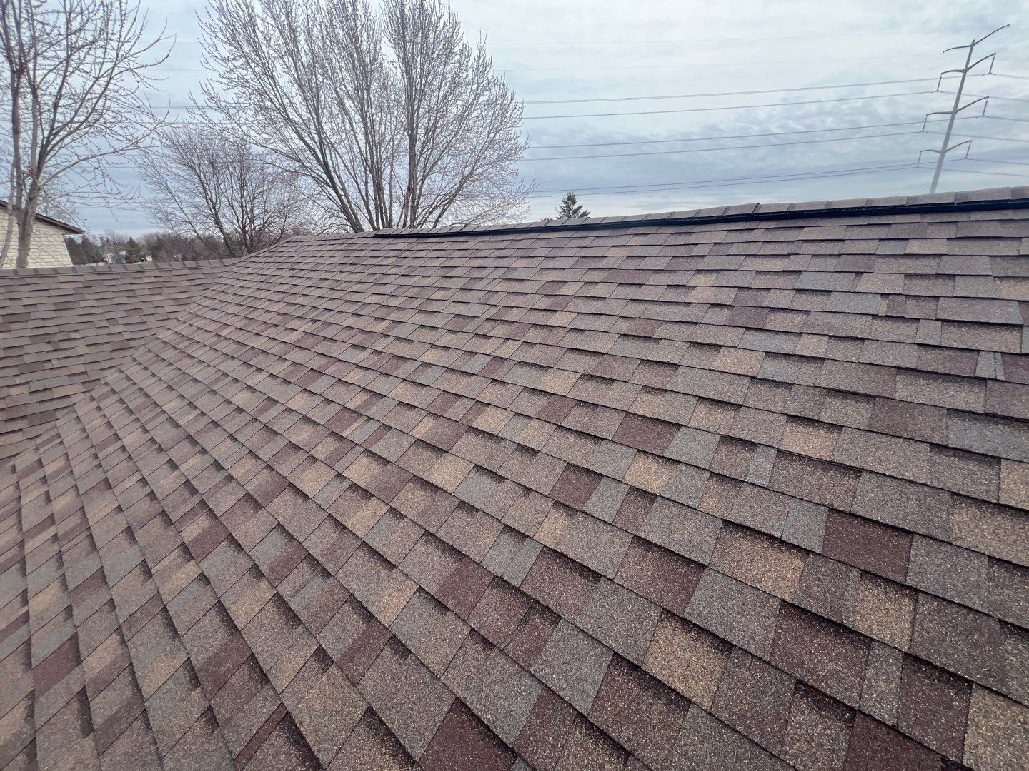 Hail Damage Roof Replacement – Owens Corning Duration in Teak | Cottage Grove, MN by First Impressions Exteriors