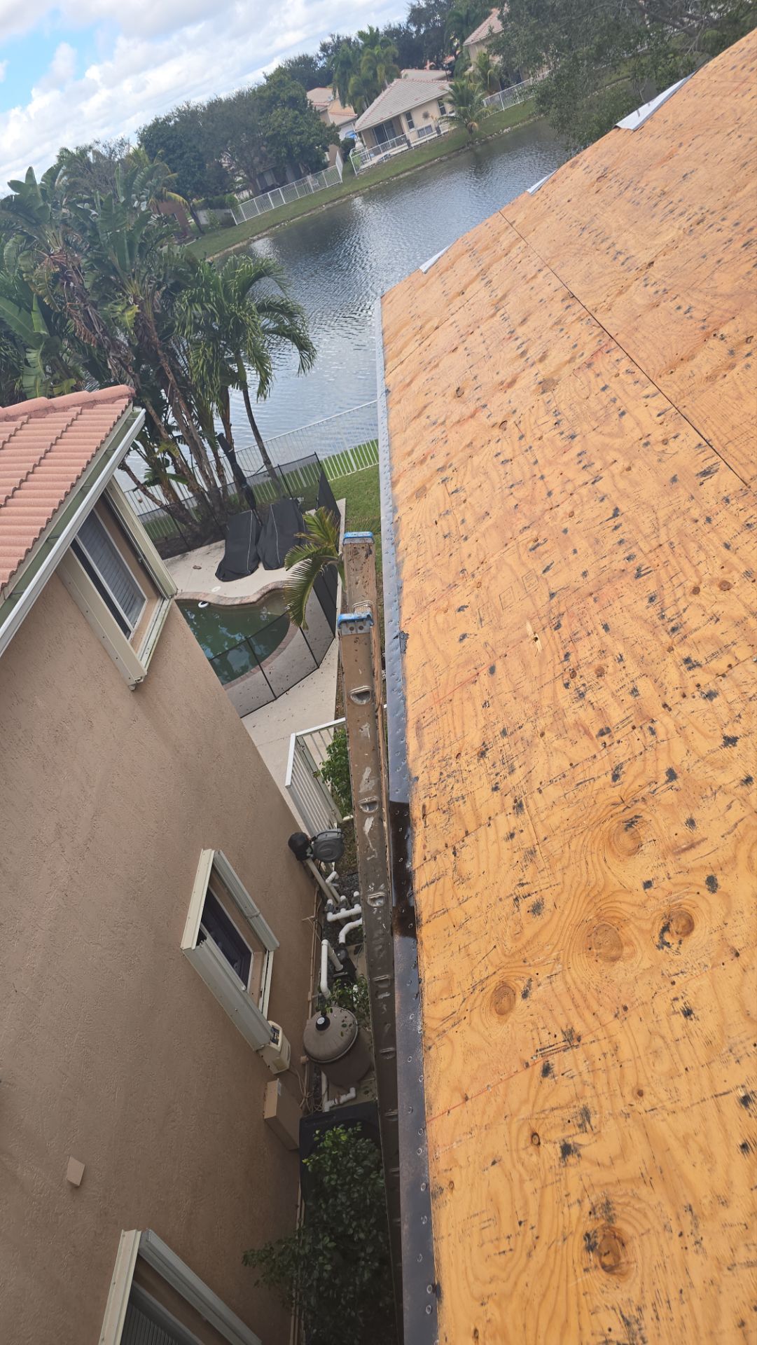 Coconut Creek Residential Tile Roof Replacement with Hurricane Ties by Aastro Roofing