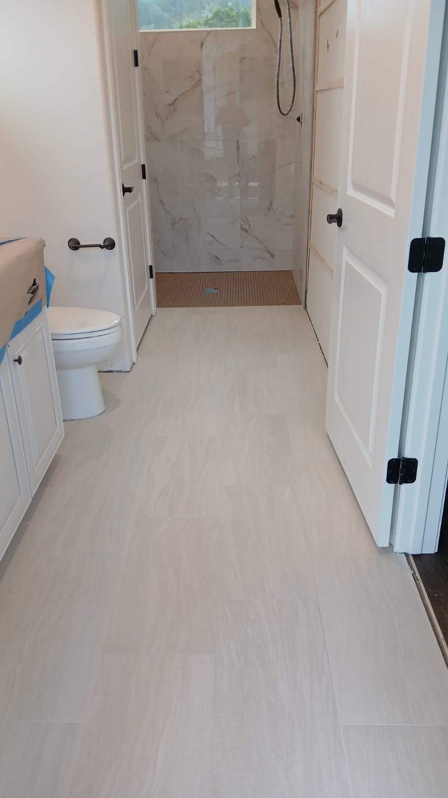 Kitchen and Bathroom Remodel Featuring Custom Stone and Tile in Mico by Mena stone surfaces