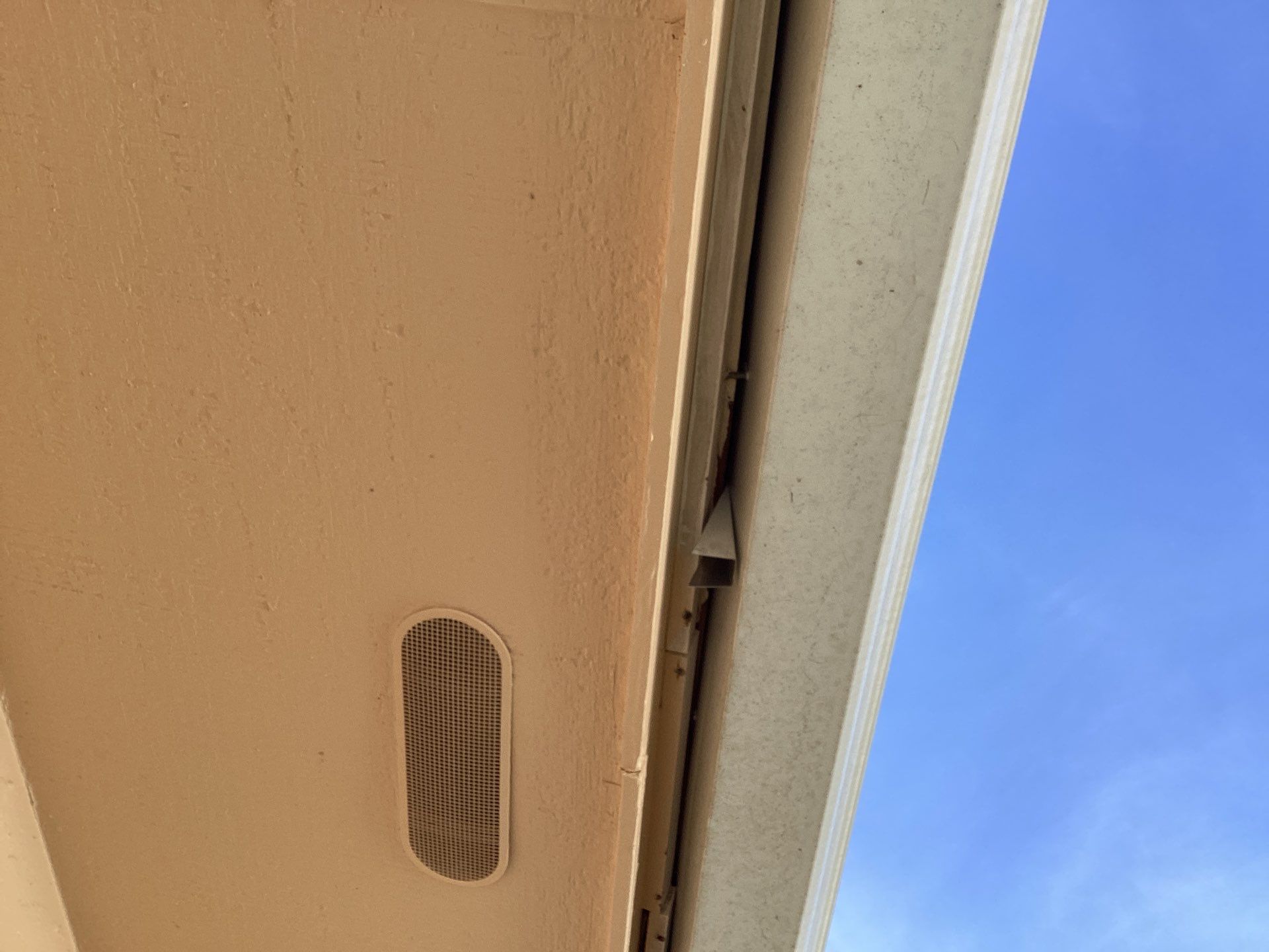 White K Style Seamless Gutters using 3X4 Elbow Downspout in Cape Coral FL by Gutter Professors