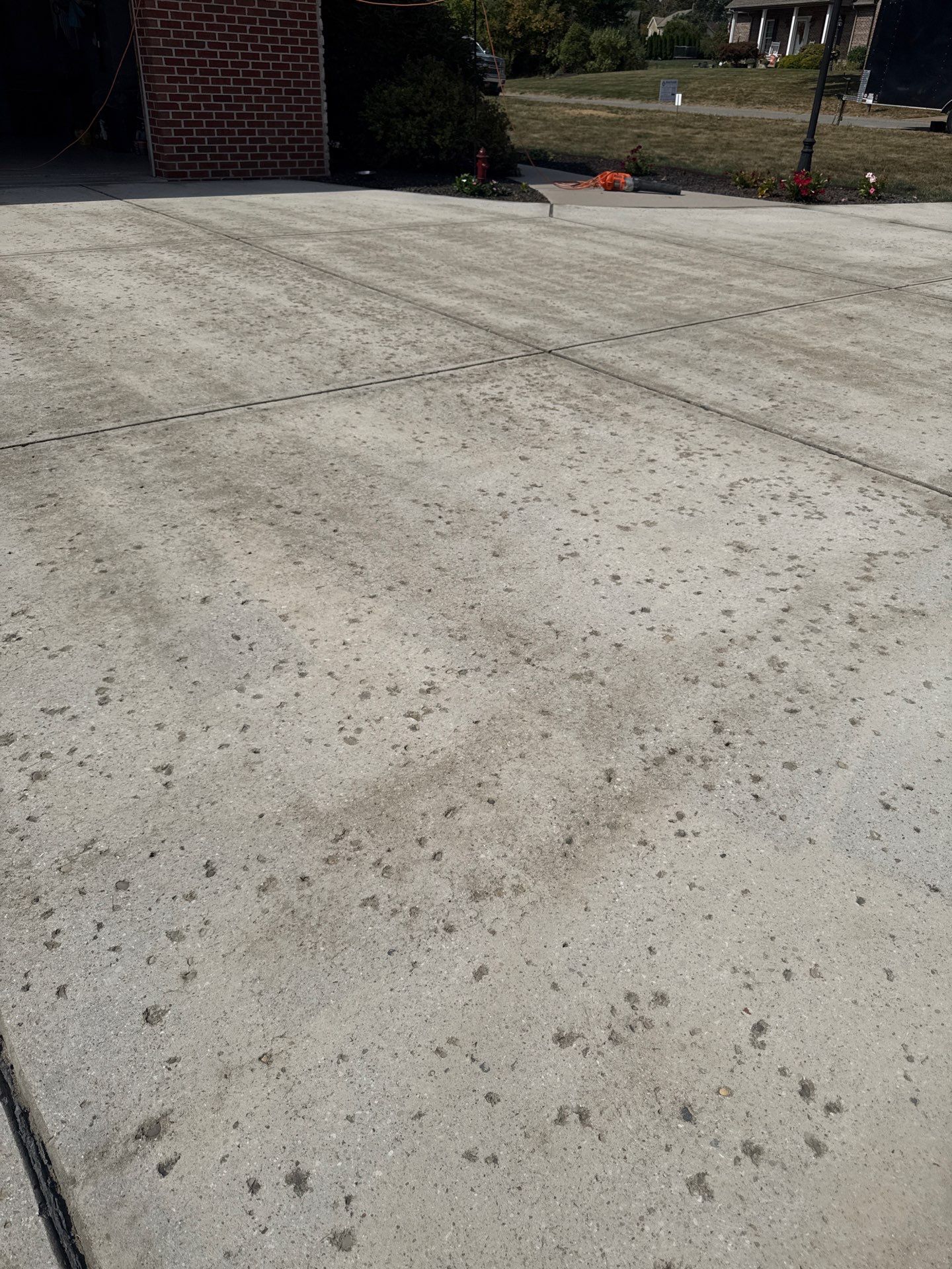 Driveway + Garage + Walkway Project in Meridian by Floors in a Day, Inc