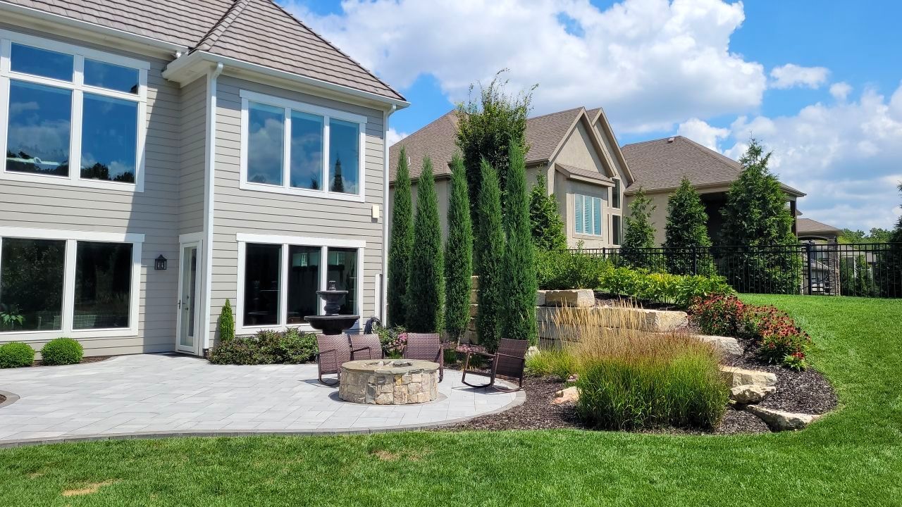 Front Yard Landscape and Walkway Renovation in Overland Park by LAND ESCAPES LLC