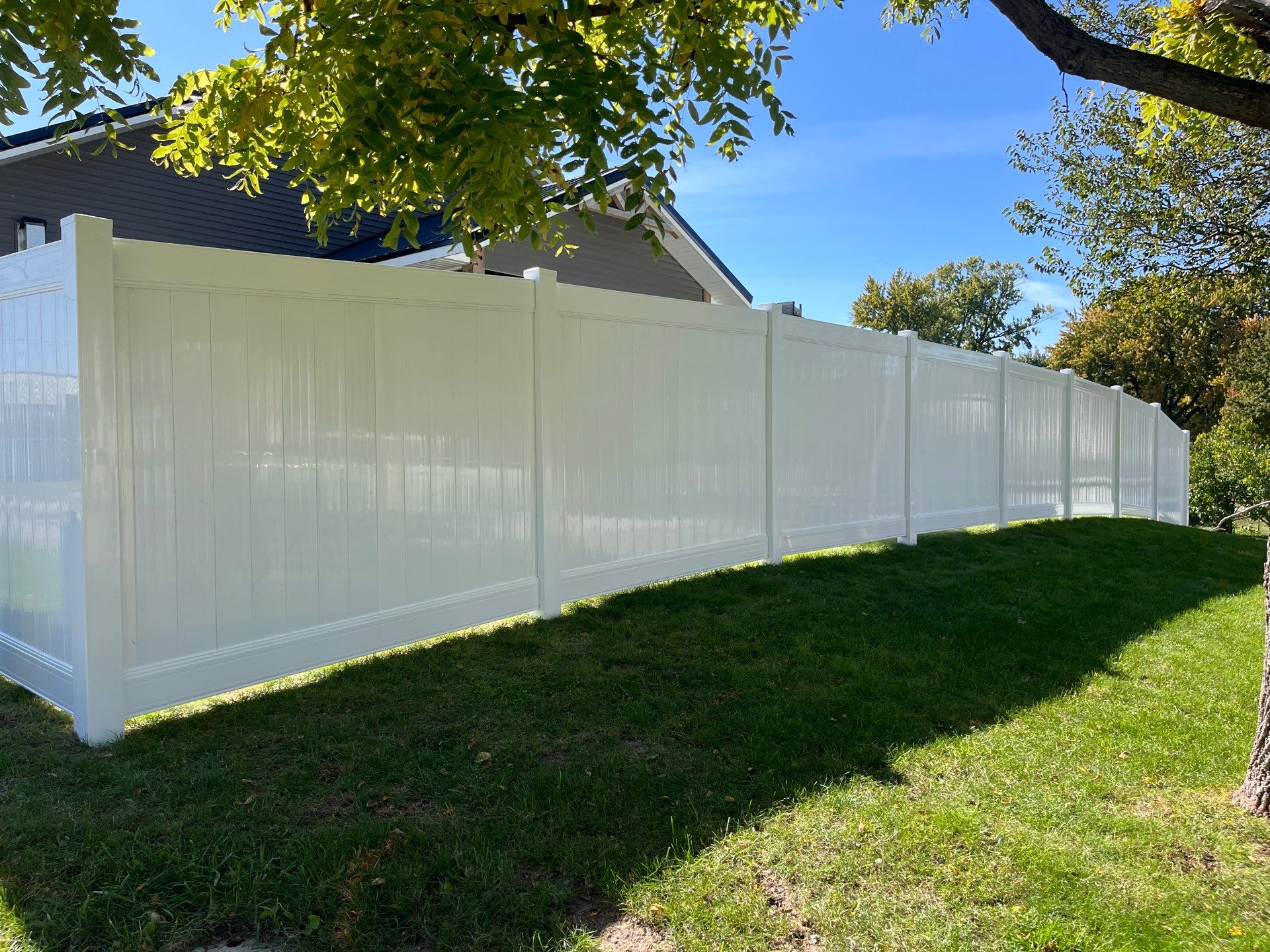 White Vinyl Privacy Fence Installation in Grundy Center by Perfect Picket Fence and Stain