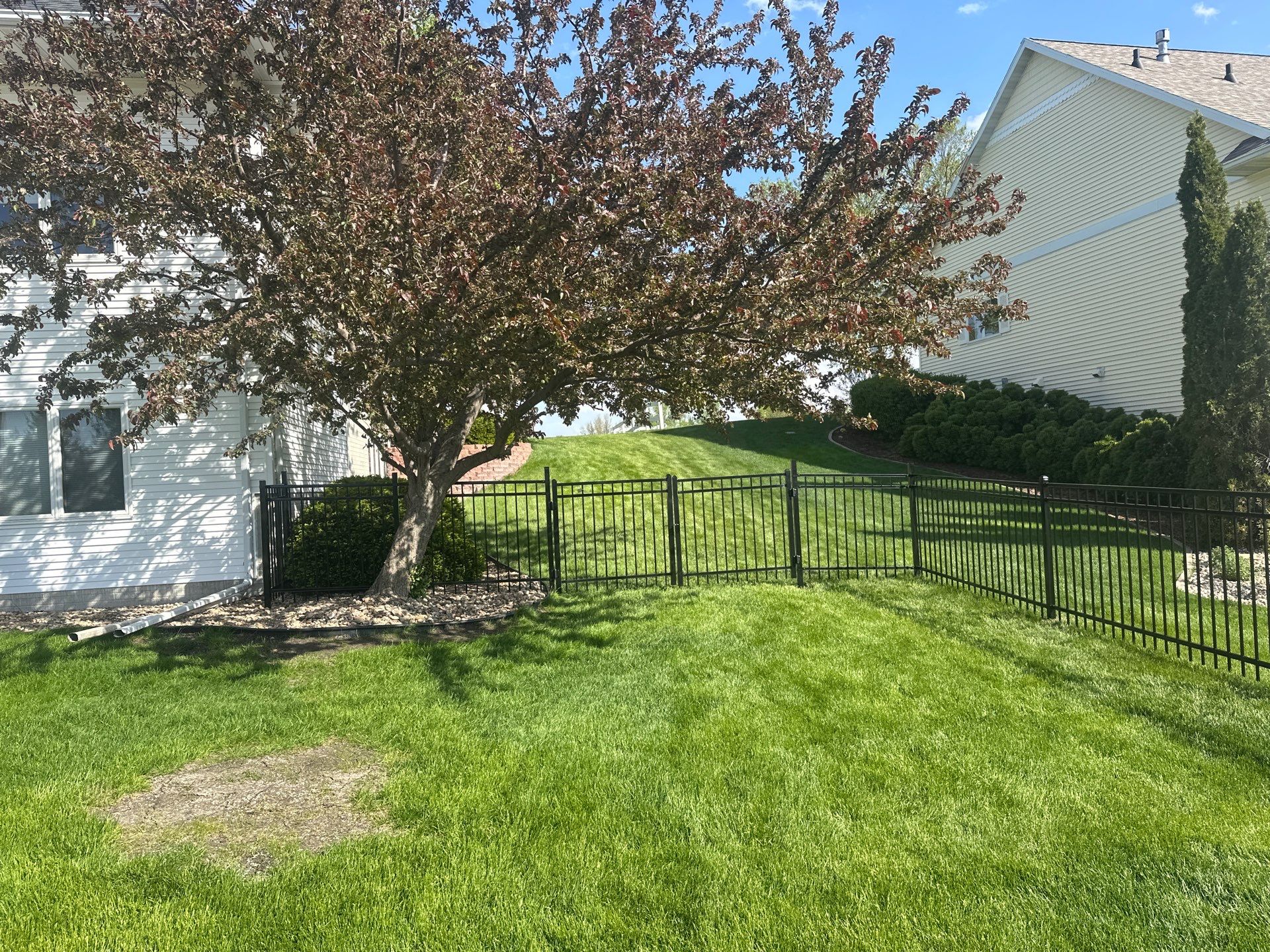 Black Ornamental Metal Picket Fence Installation in Waterloo by Perfect Picket Fence and Stain