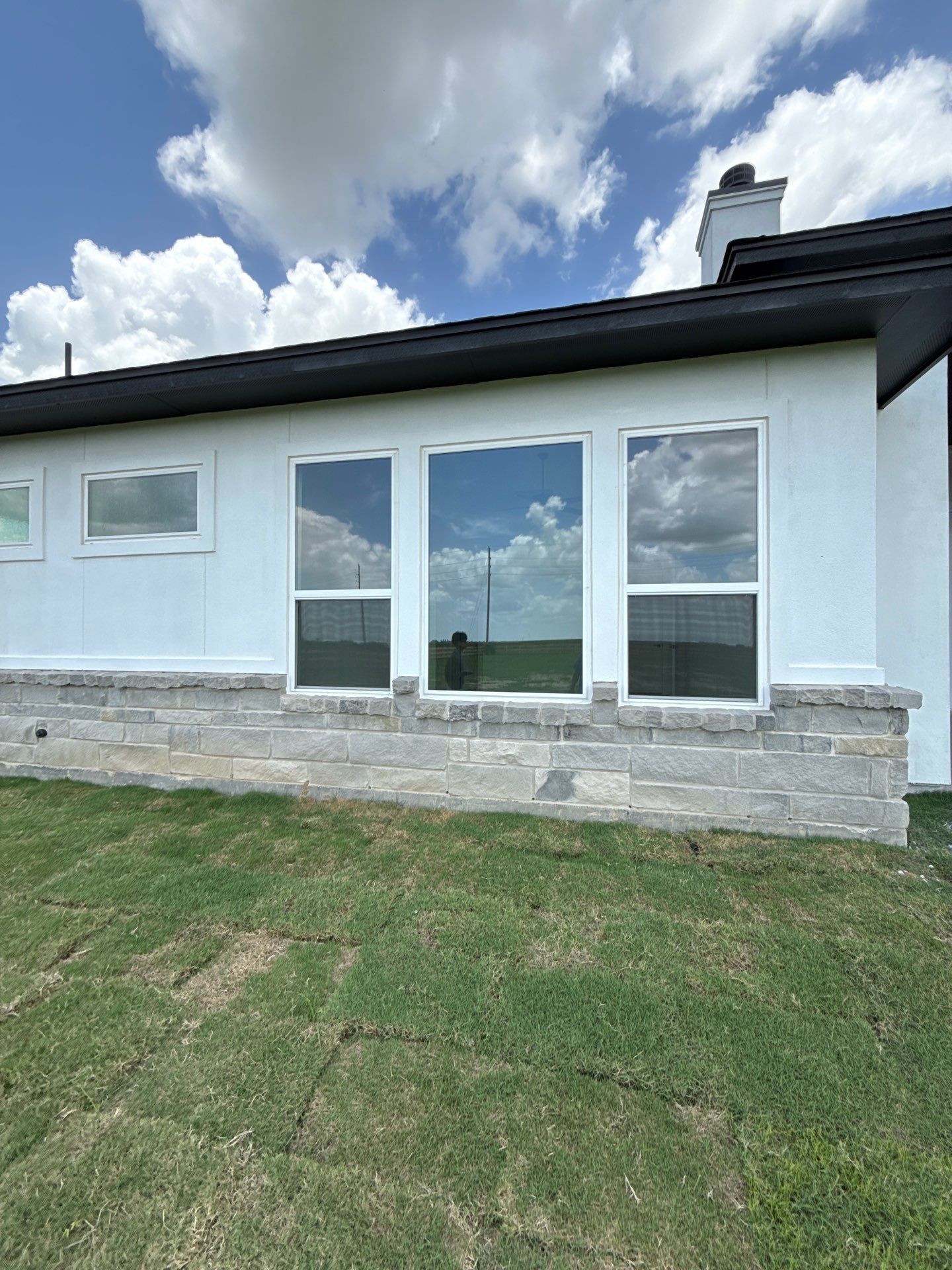 Waller Sophistication: Snowbound Color Stucco with Limestone Accents. by Apex Conventional Stucco Llc
