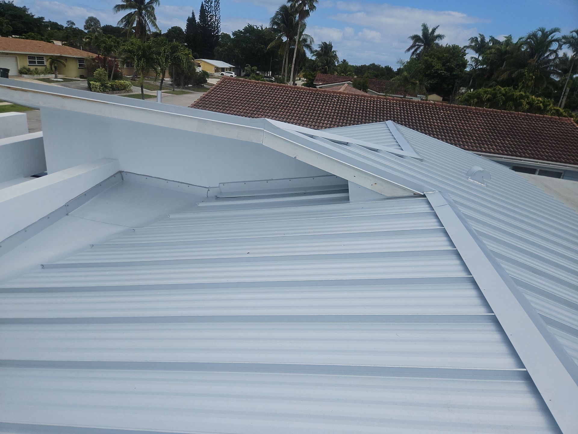 Residential Roofing Installation using 1" Nail strip metal roof by BLUES BROTHERS ROOFING