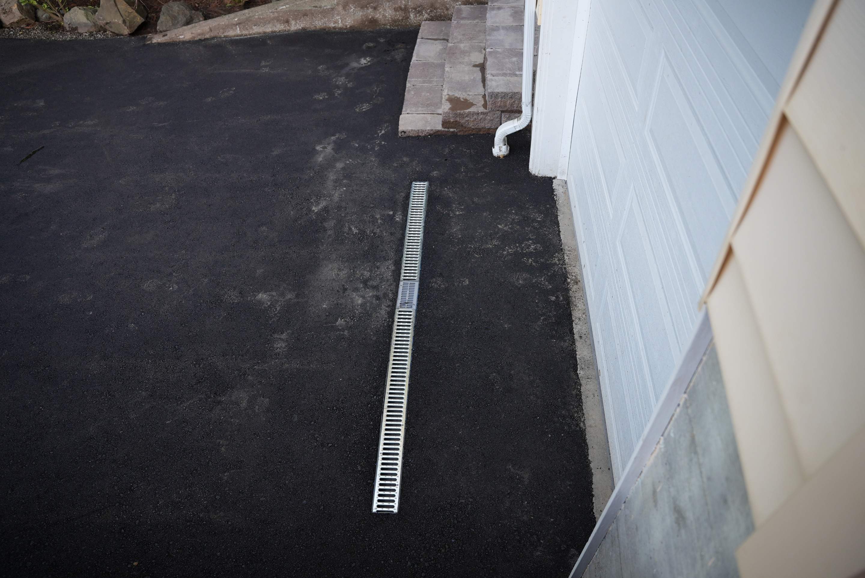 Lorra | Asphalt Driveway Repair & Retaining Wall by Jireh Asphalt & Concrete Inc 