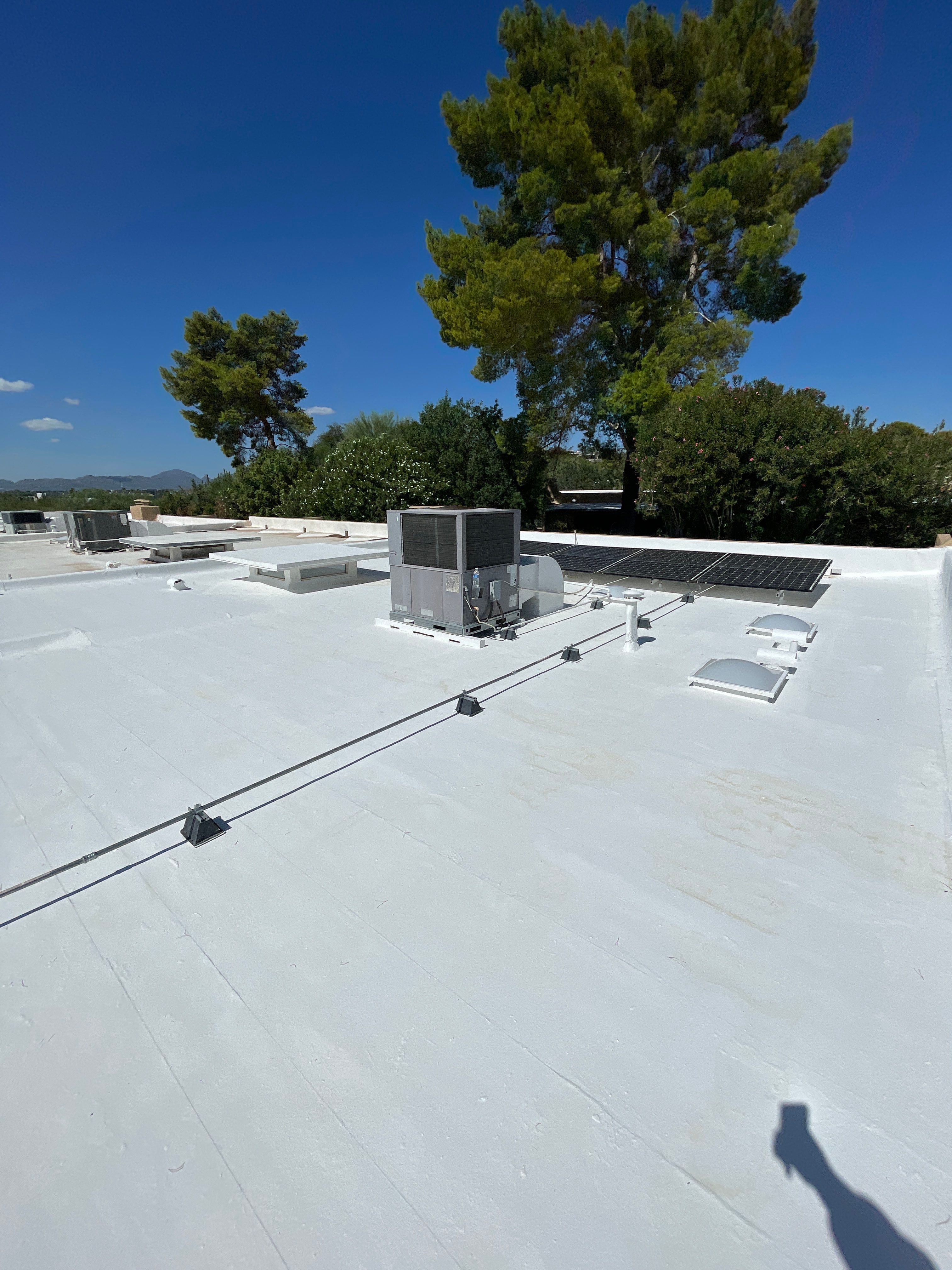 Tucson Residential Low Slope Roof Restoration and Solar Installation by West Coast Roofing AZ