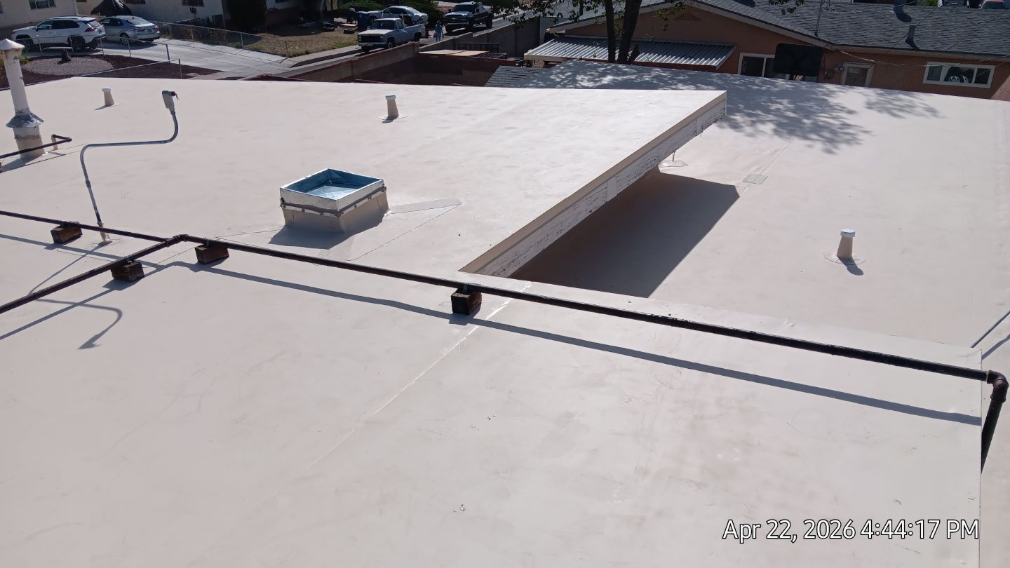 Residential TPO Roof Replacement and skylight replacement in Albuquerque by Doyle Roof Masters Inc