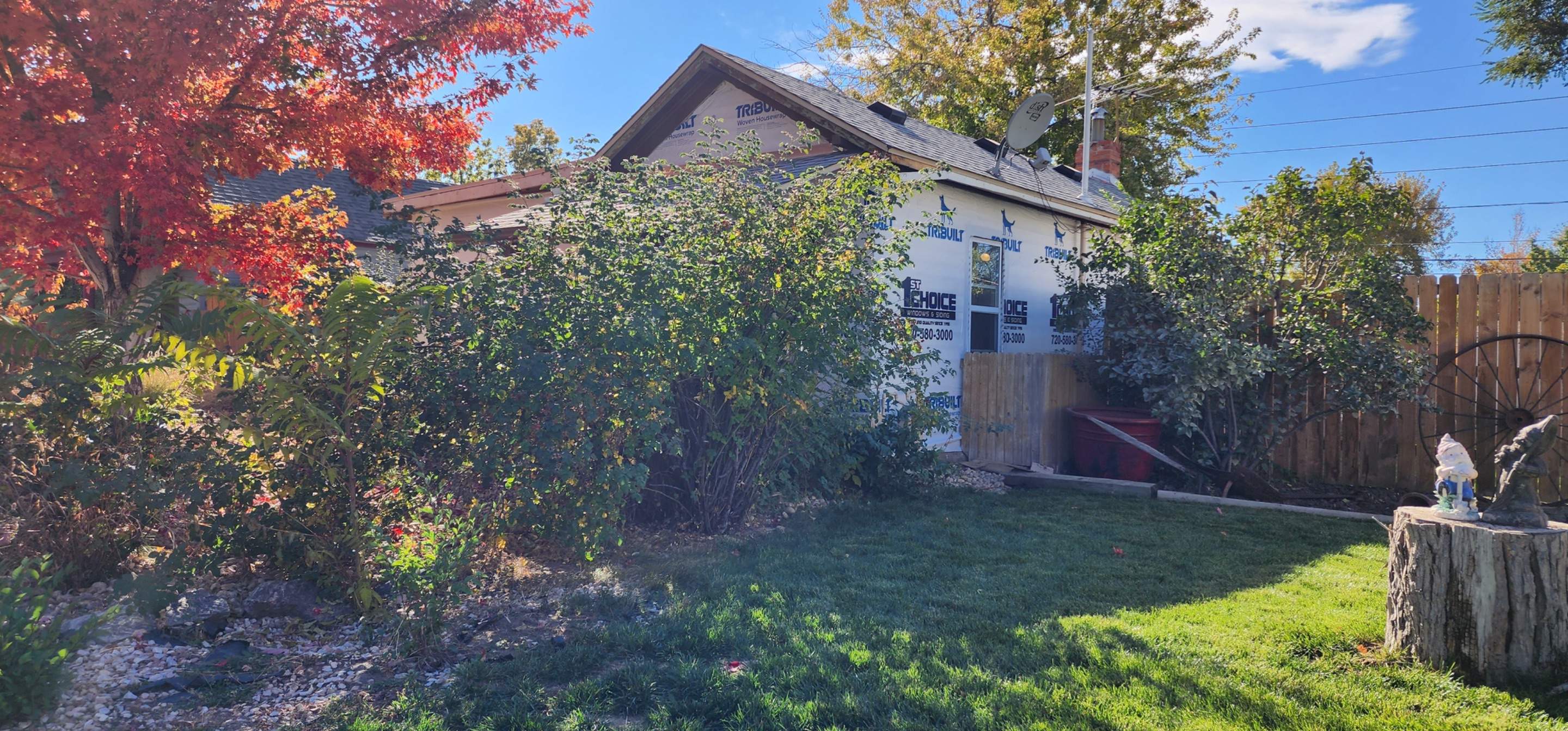 Beautiful little home in Denver receiving Lp Smartside Siding by 1st choice windows and siding