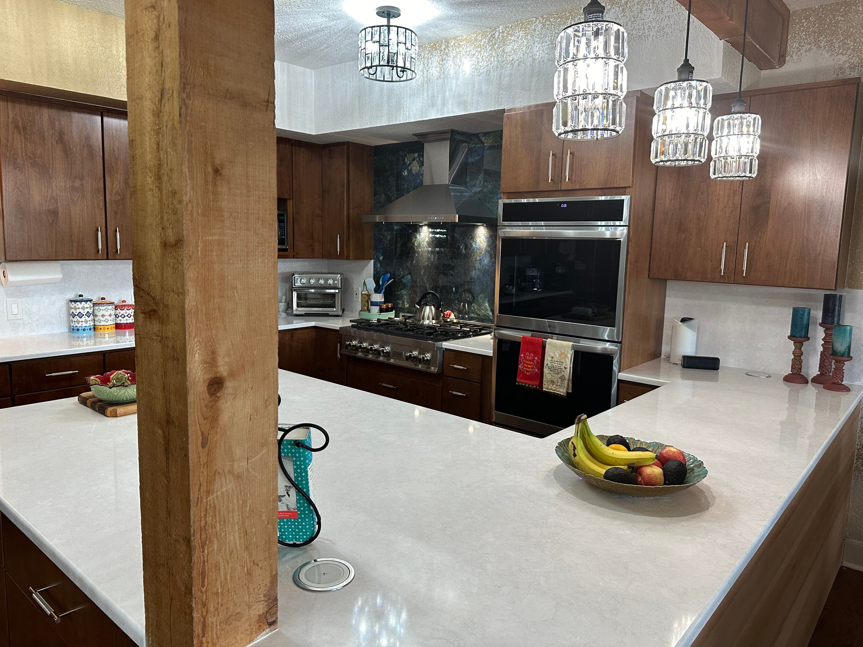 Custom Kitchen Renovation and Master Shower Installation in Pipe Creek by Mena stone surfaces