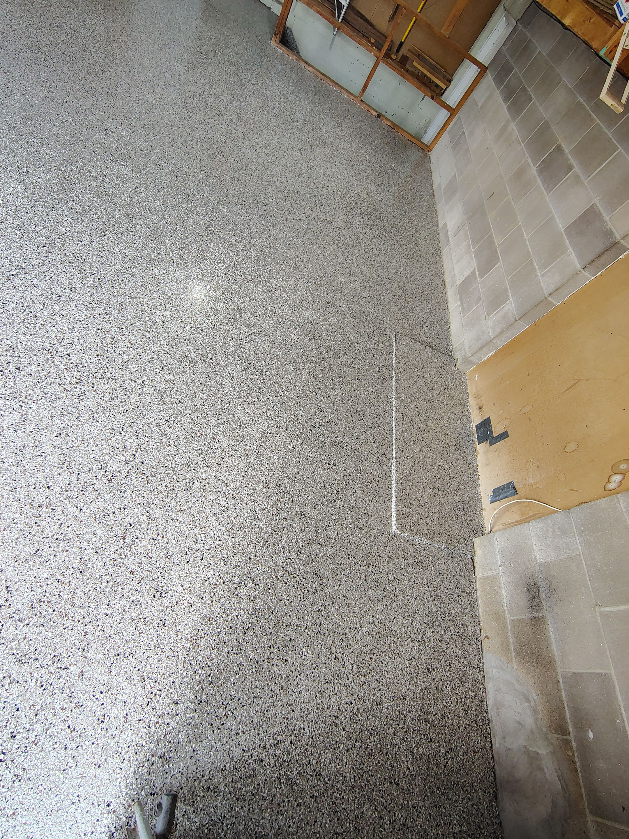 Sioux Falls Garage Epoxy Floor Installation and Concrete Crack Repair by Select Painting, Coatings & Garage Cabinets