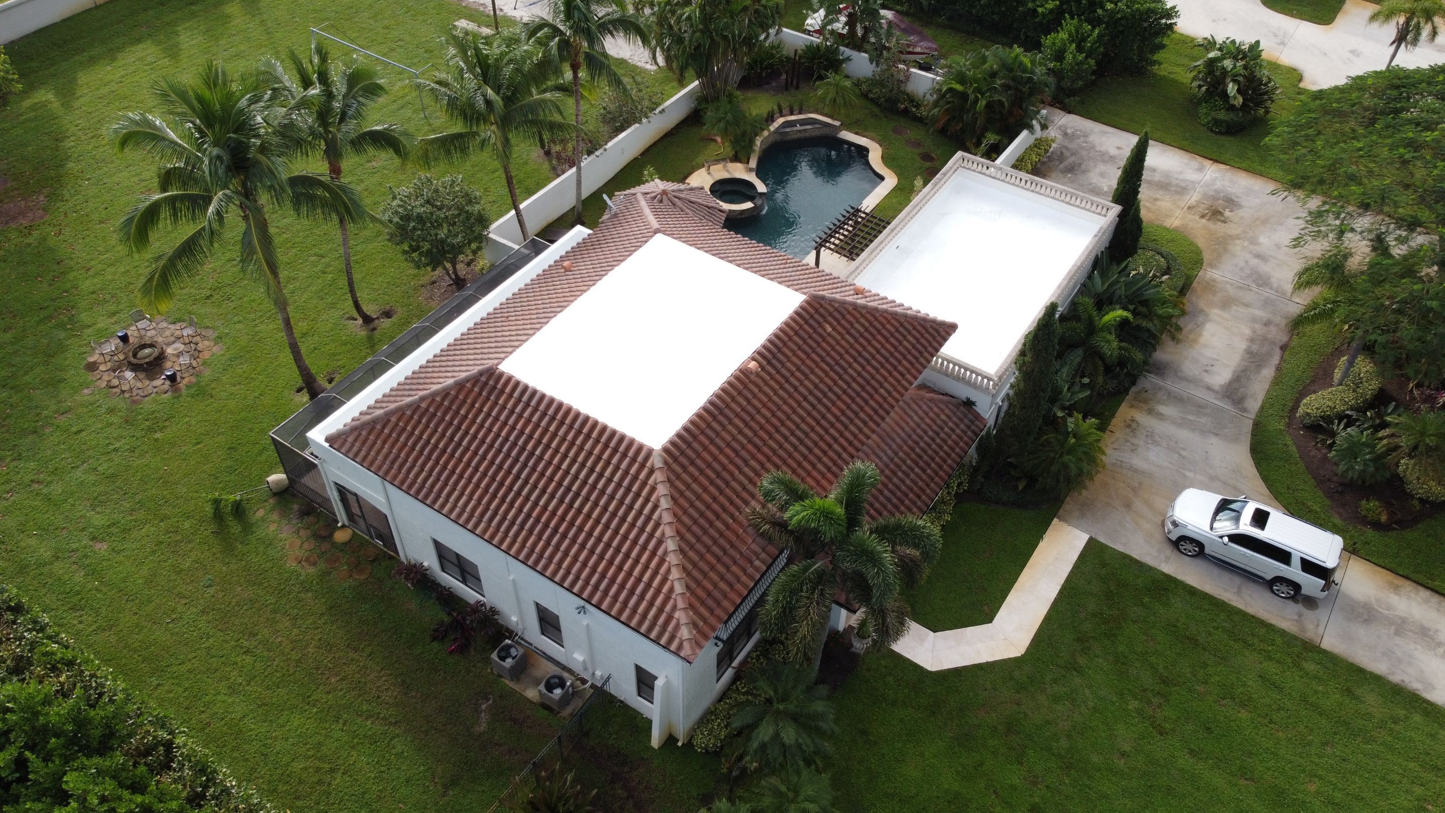 Residential Roofing Installation using Polybrite 90.1 silicone coating by BLUES BROTHERS ROOFING
