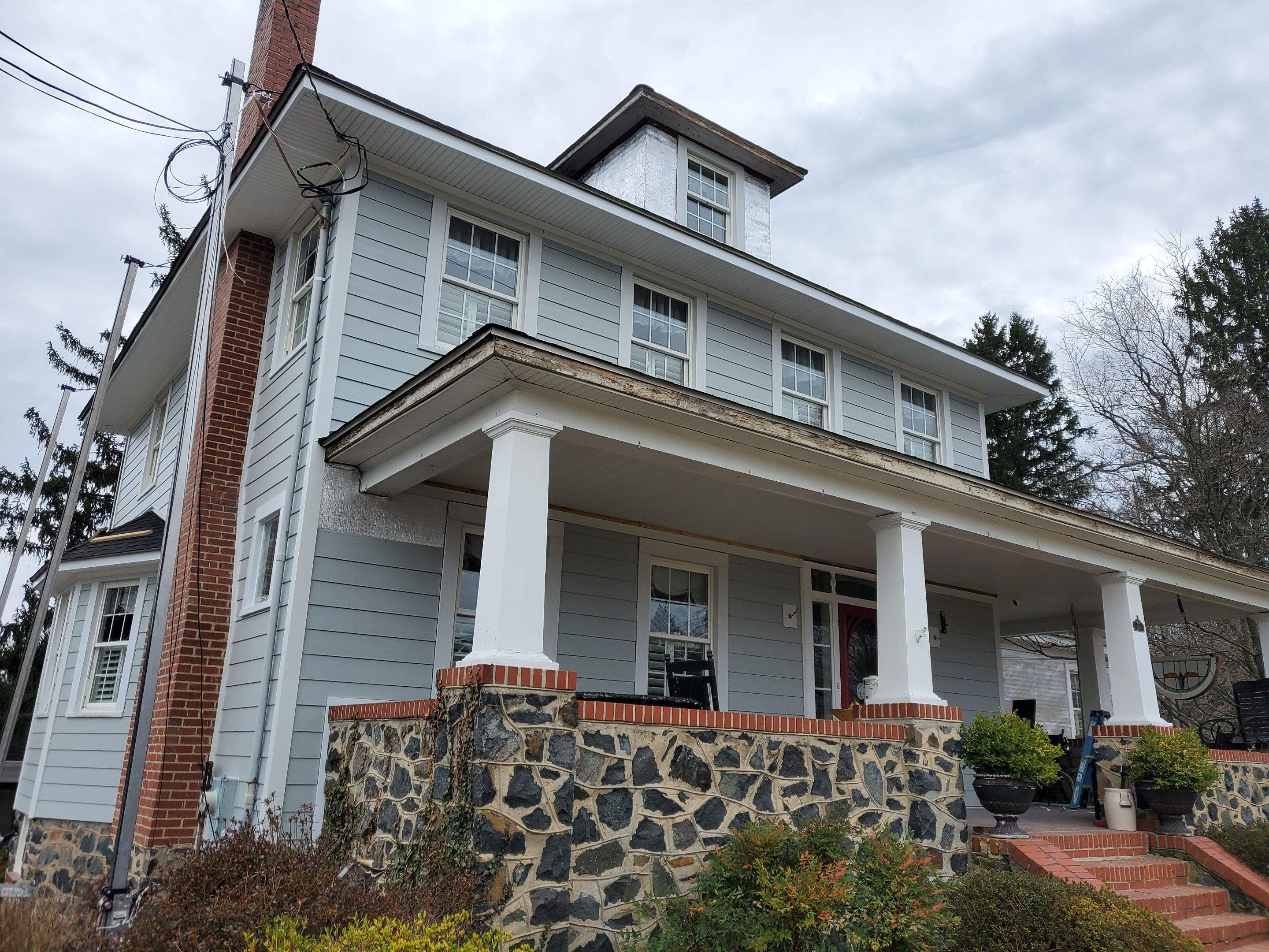 Siding Replacement using James Hardie siding by American Home Contractors