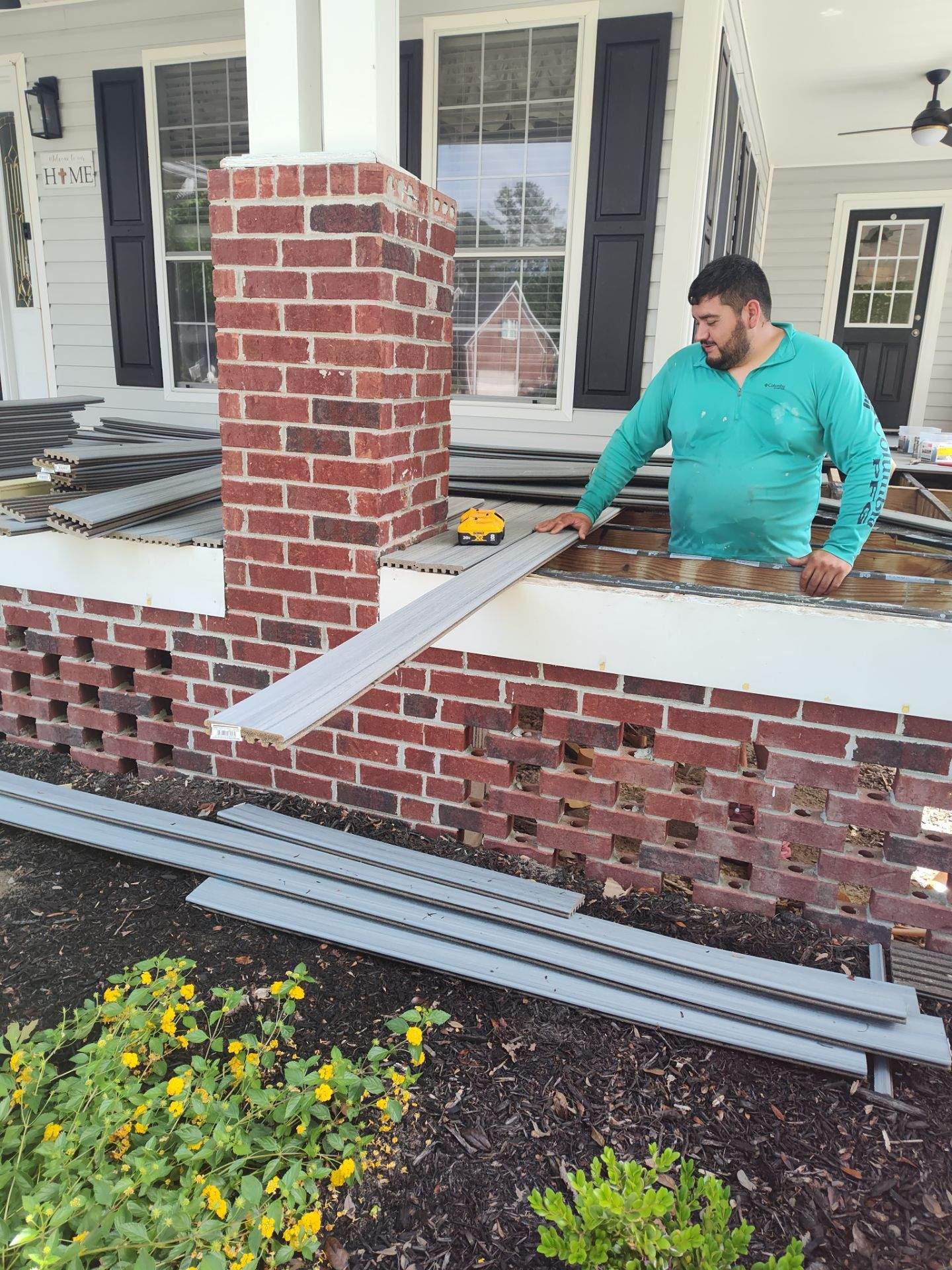 Outside porch and concreate work by Cornerstone Home Builders, LLC