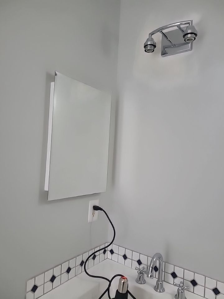 Cozy, Modernized Bathroom Retreat in Cary by Elite Remodeling and Design LLC