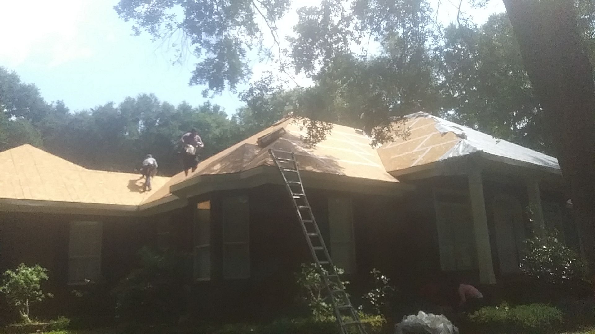 Residential Roofing Installation using Metal roofing by American Roofing & Construction LLC