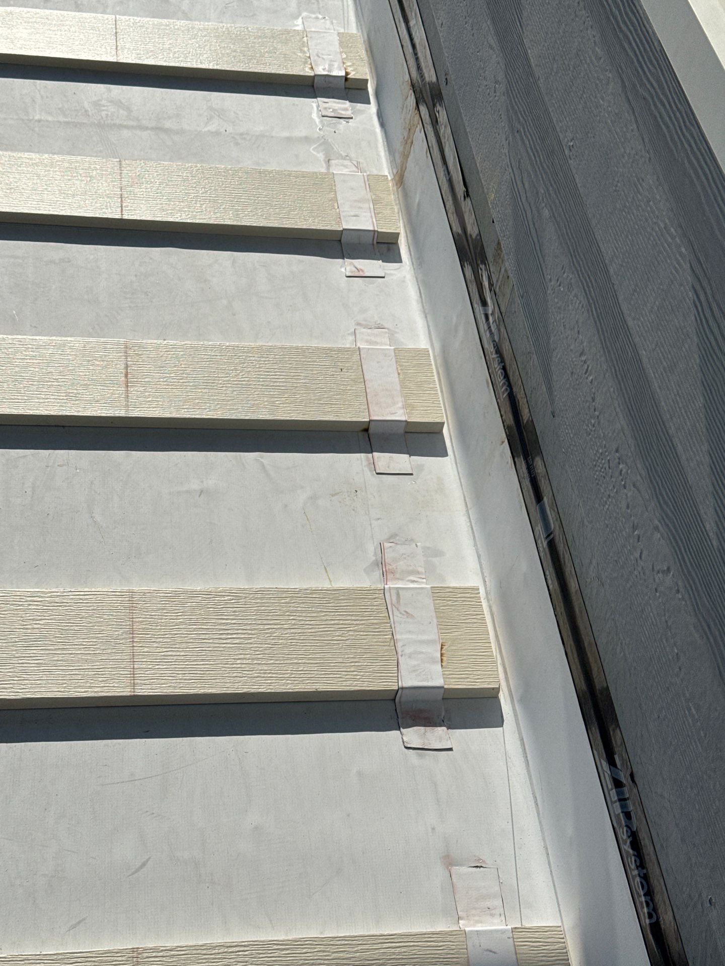 Walk Out Patio Cover by Bayfront Roofing and Construction