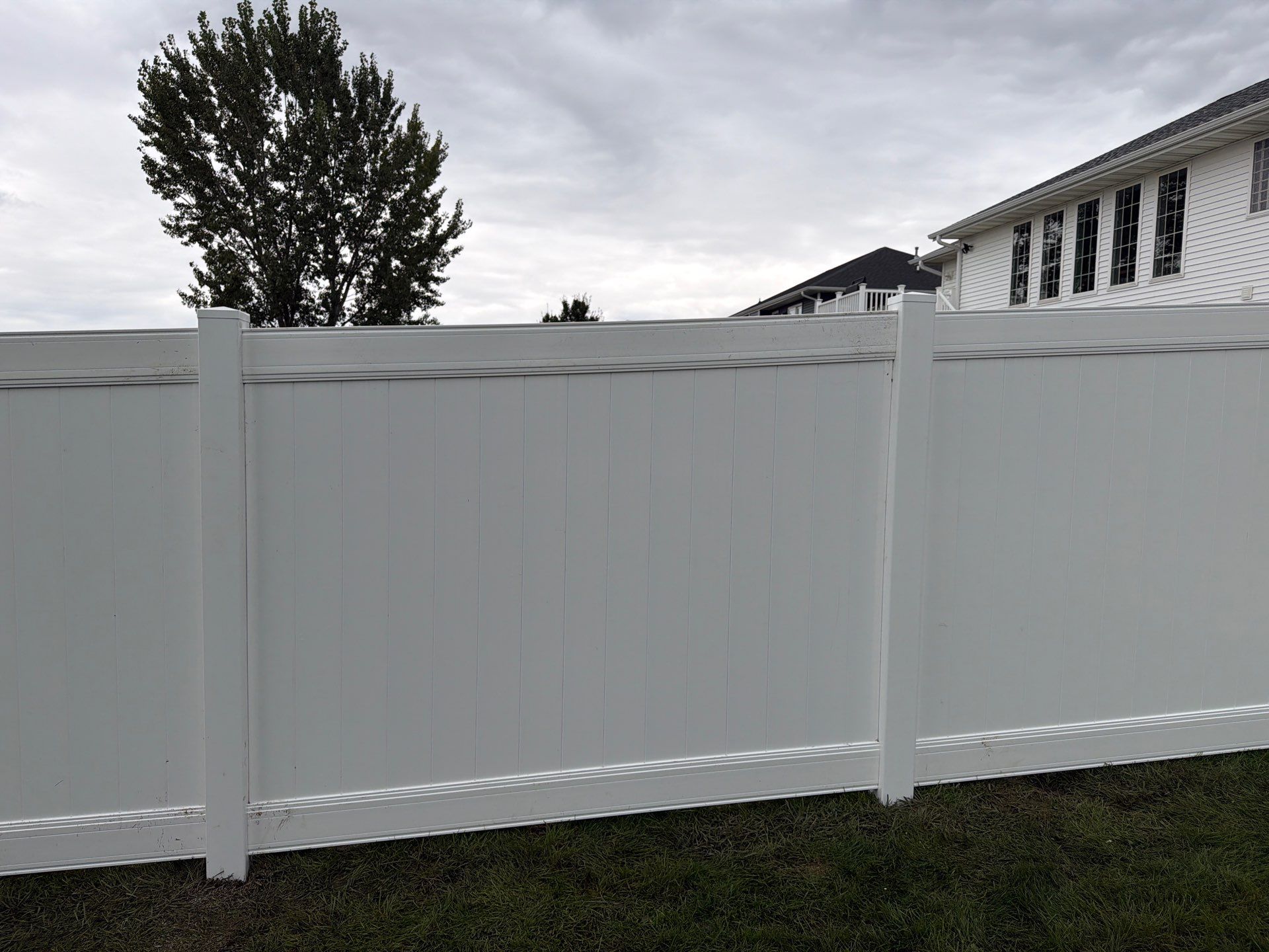 Residential Vinyl Privacy Fence Installation in Urbana by Perfect Picket Fence and Stain