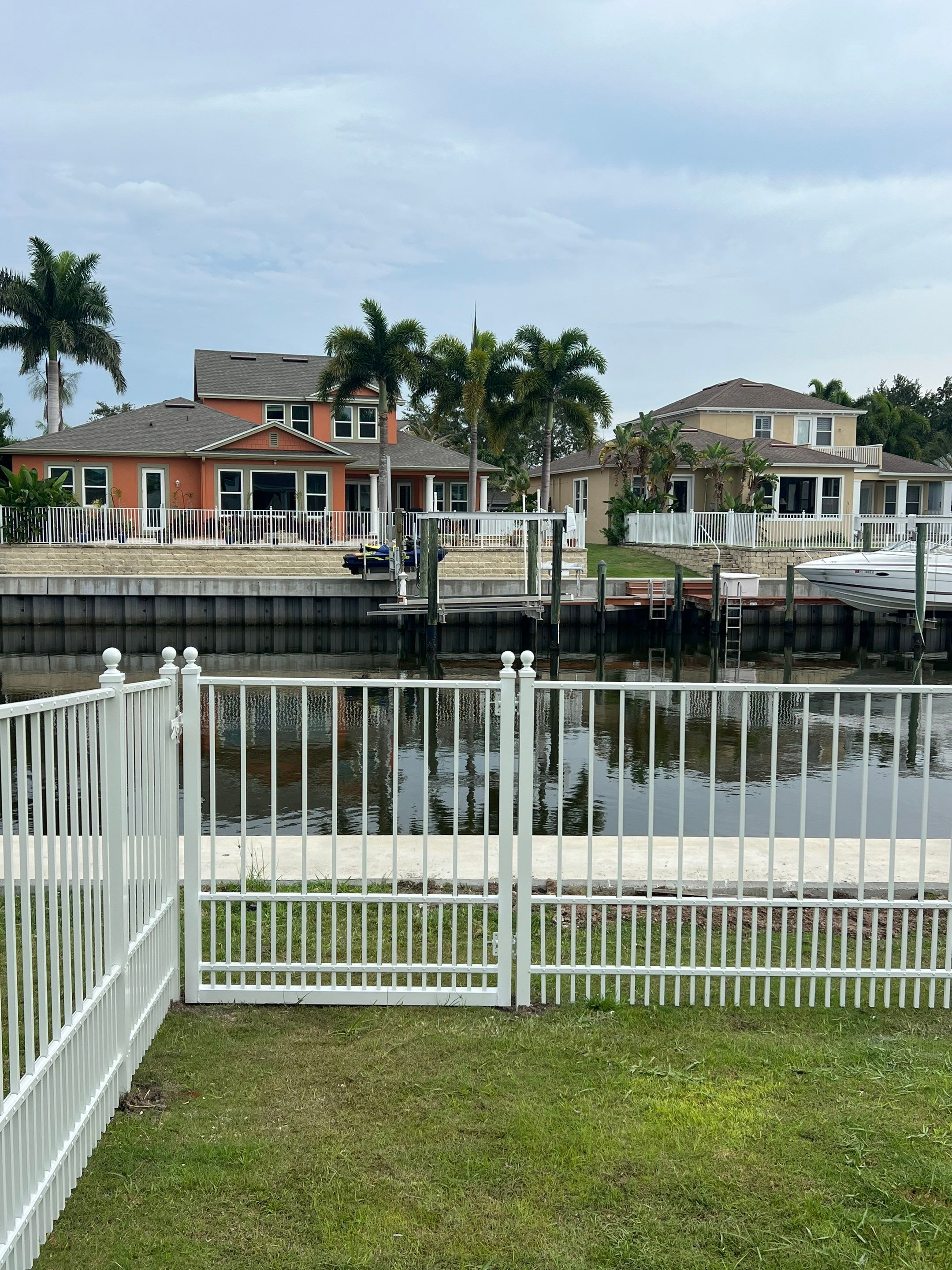 Aluminum Fence Installation using White Aluminum Puppy Picket Fence by Asap fence and gates, LLC