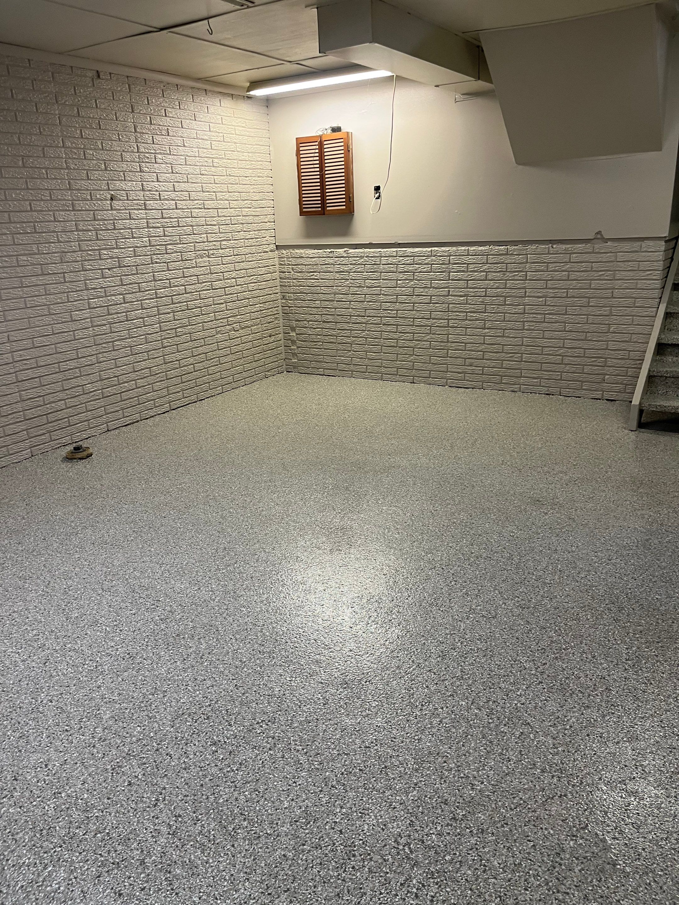 Basement Concrete Coating using Mount Everest Flakes by Revival Concrete Coatings