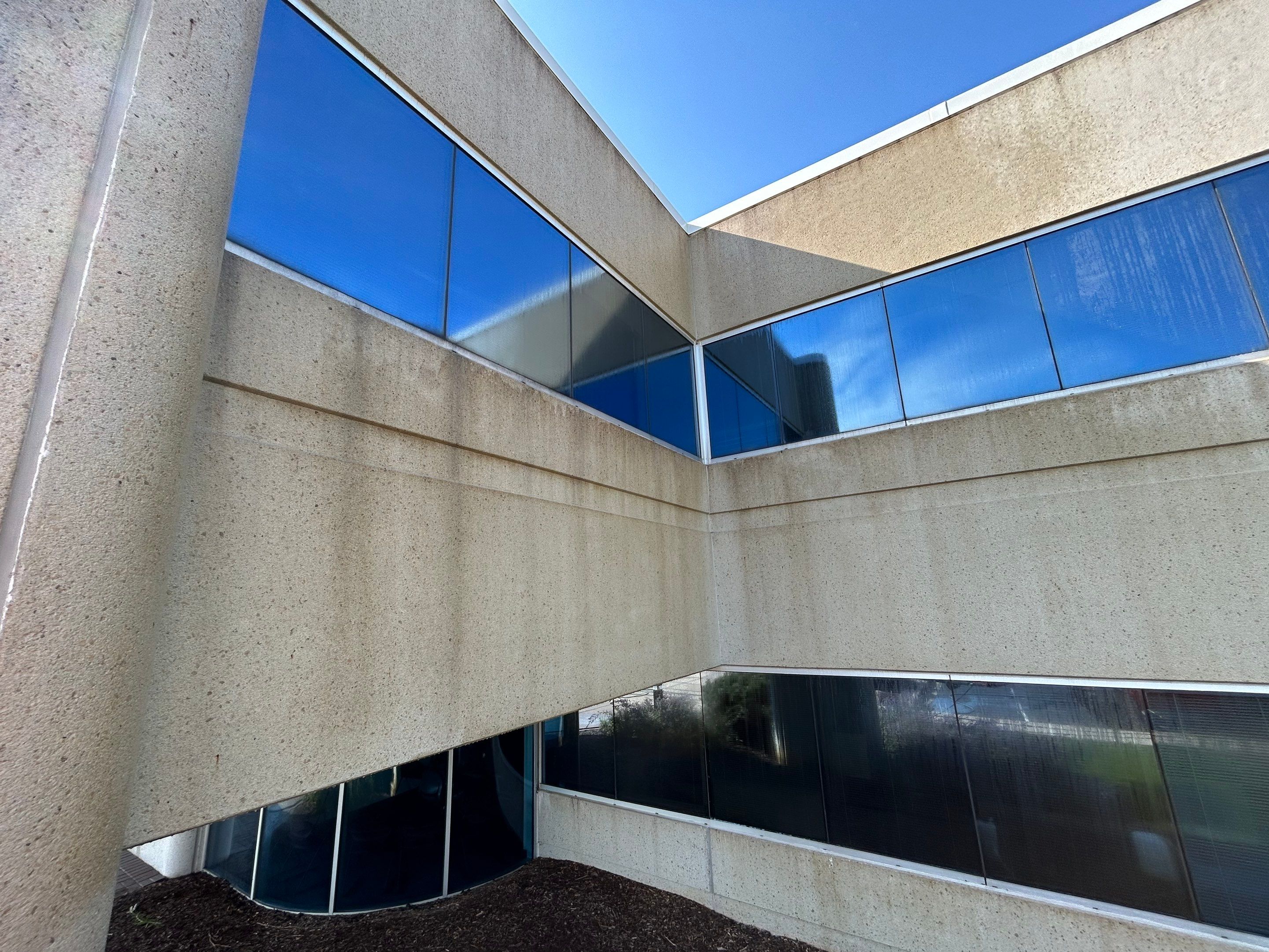 commercial pressure washing using Algaecide, soft wash soap by Northern Power Washing LLC.