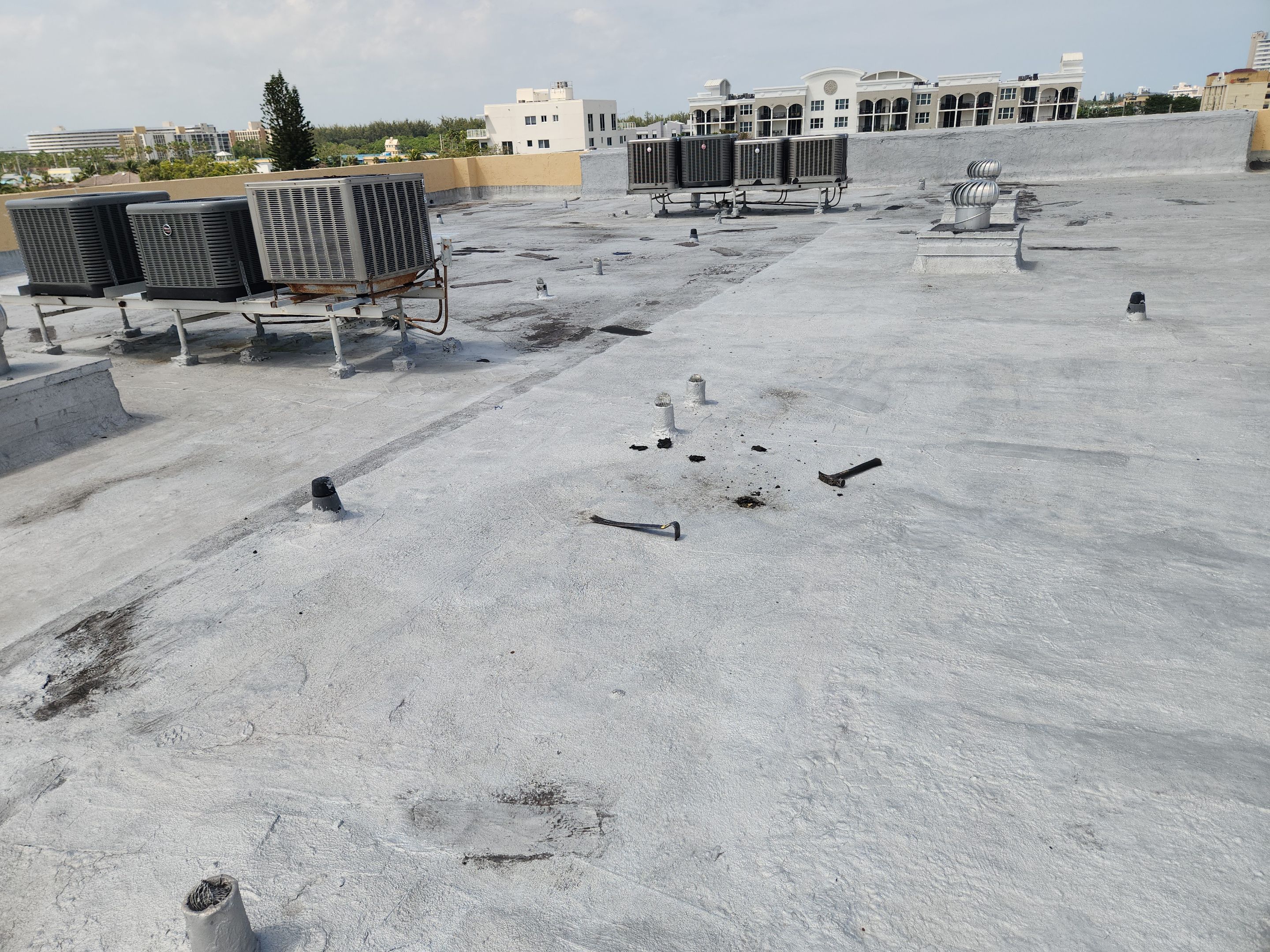 Commercial Flat Roof Repair and Silicone Coating in Deerfield Beach by Aastro Roofing