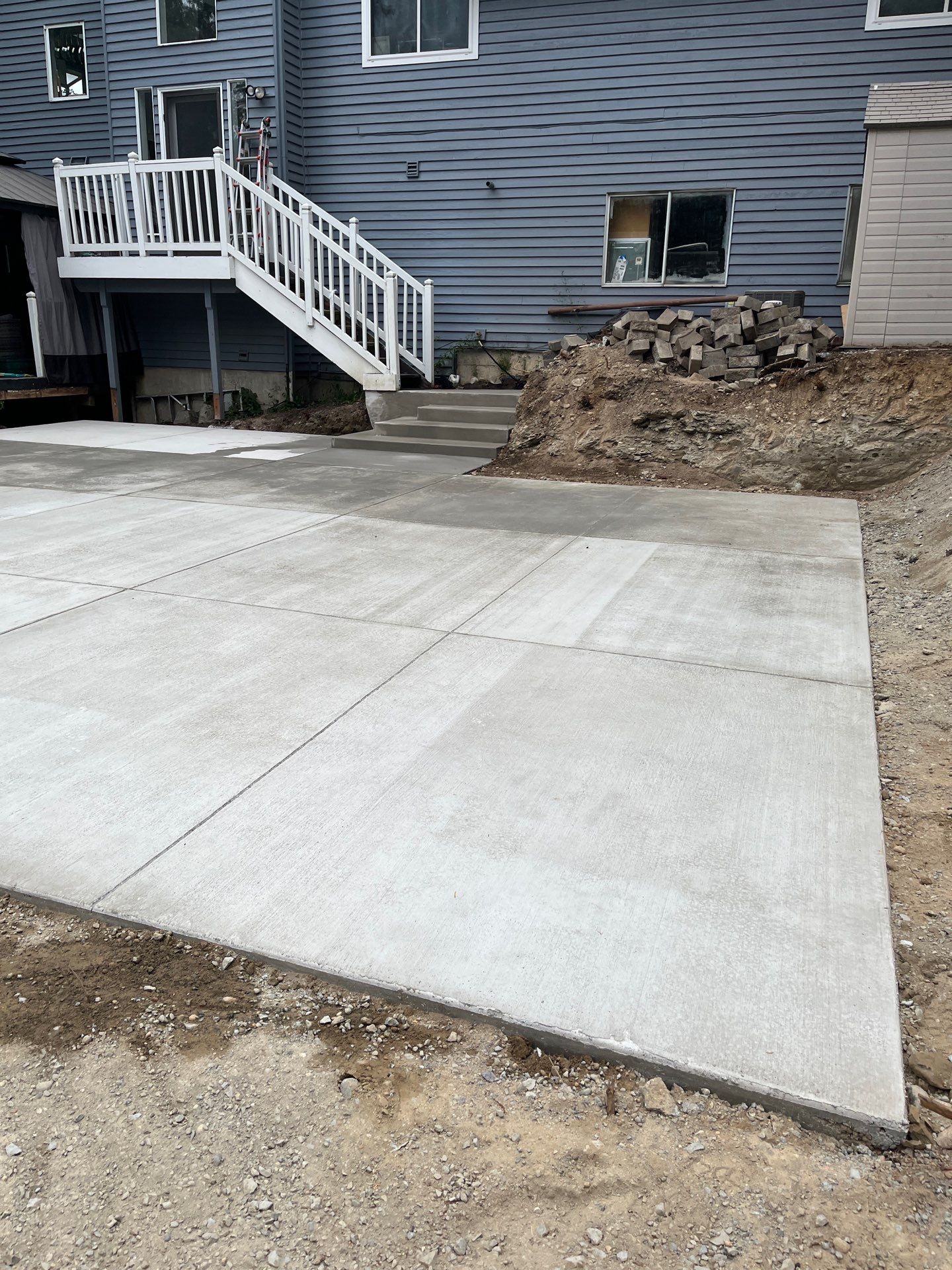 Concrete Back Patio Makeover  by Jireh Asphalt & Concrete Inc 