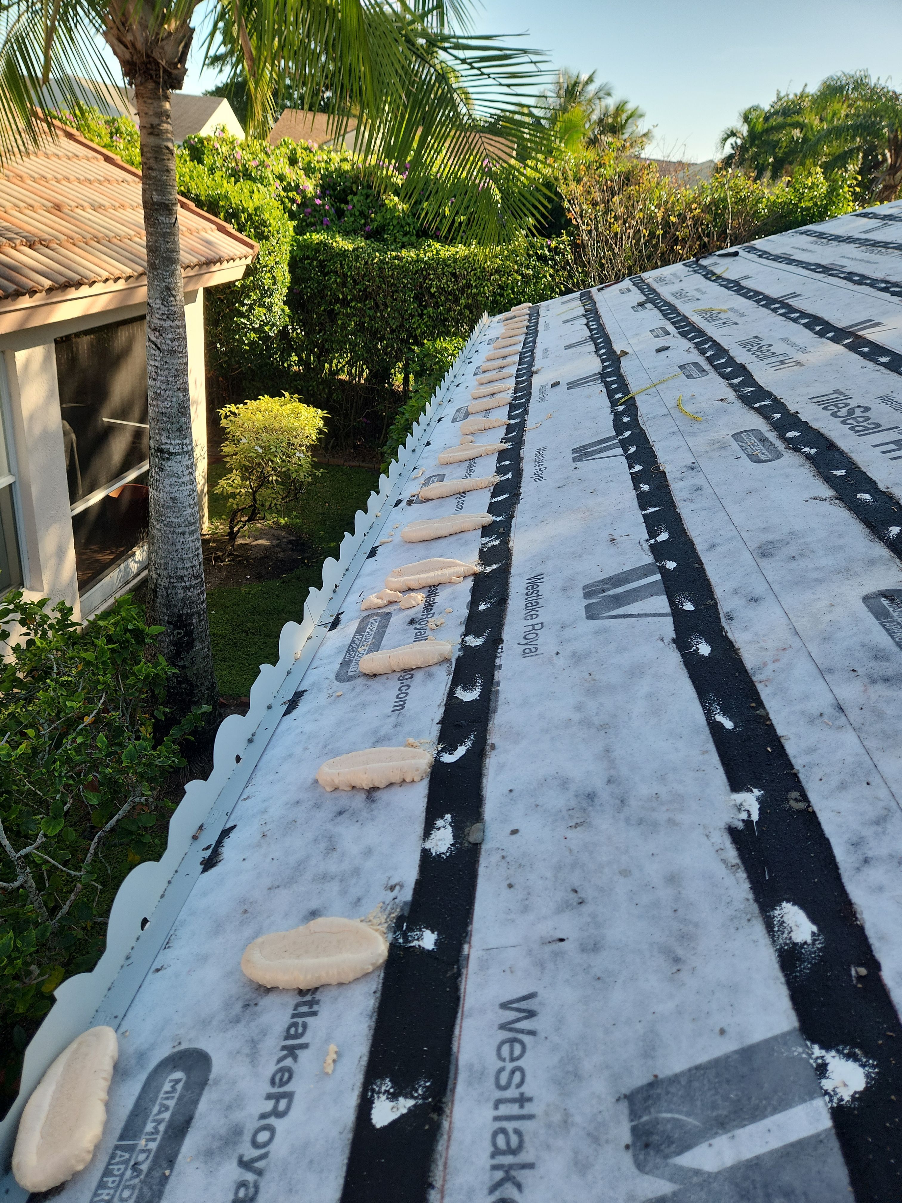 Concrete Tile Roof Replacement and Wood Decking Repair in Boca Raton by Aastro Roofing