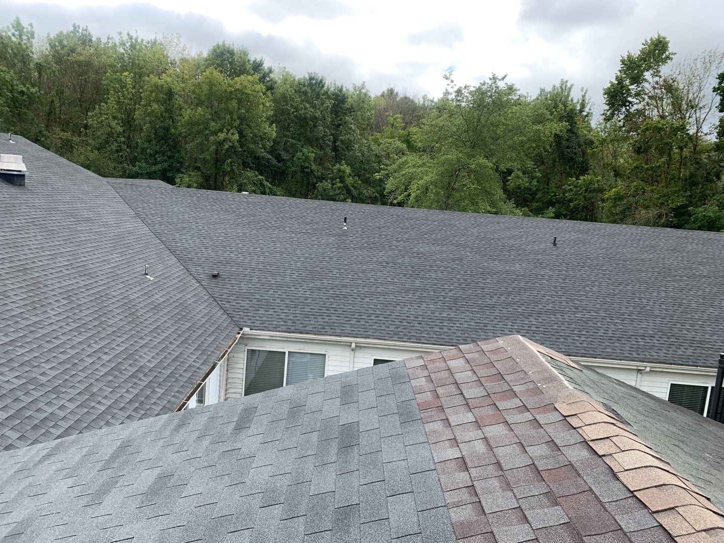 Re Roof  by American Roofing NC