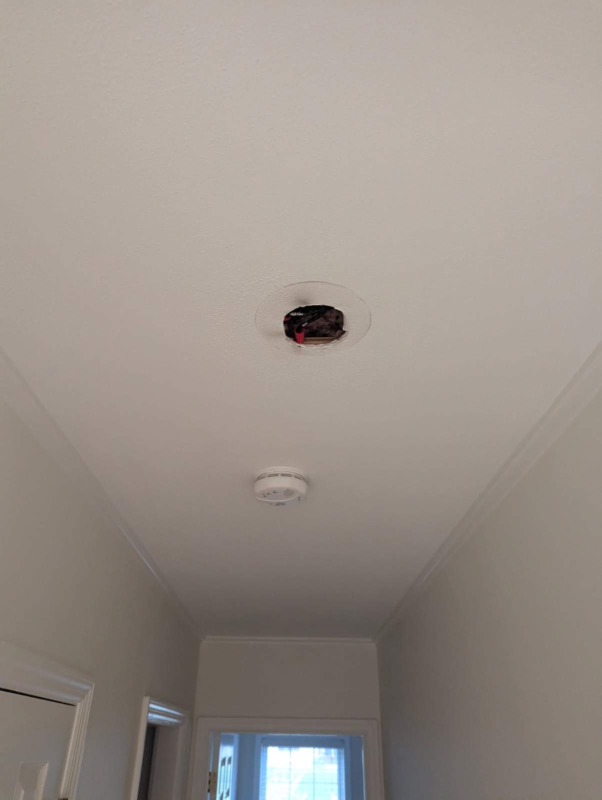 Dual Storm Door & Recessed Lighting Installation – St. Louis, MO by Legendary Services Company LLC.