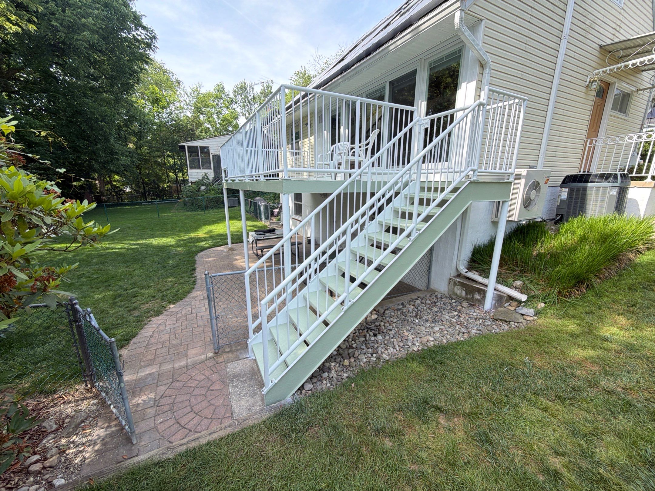 White Powder-Coated Outdoor Railings in Rockville & Staircase and Deck Refurbishment  by Capitol Iron Works