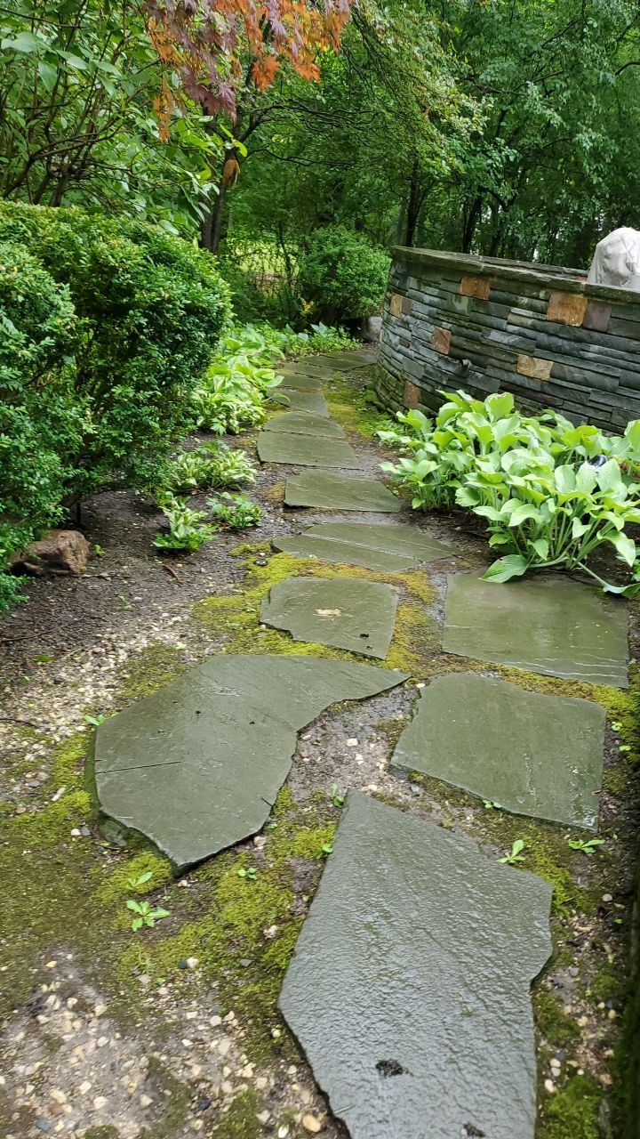 Bluestone patio cleaning by Northern Power Washing LLC.