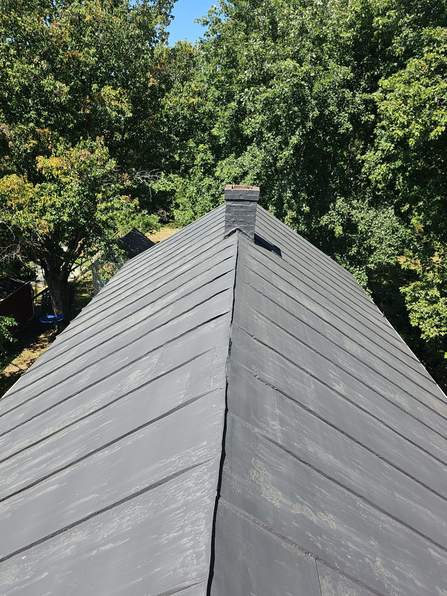 Metal Roof and Gutter Replacement by Winchester Roofing