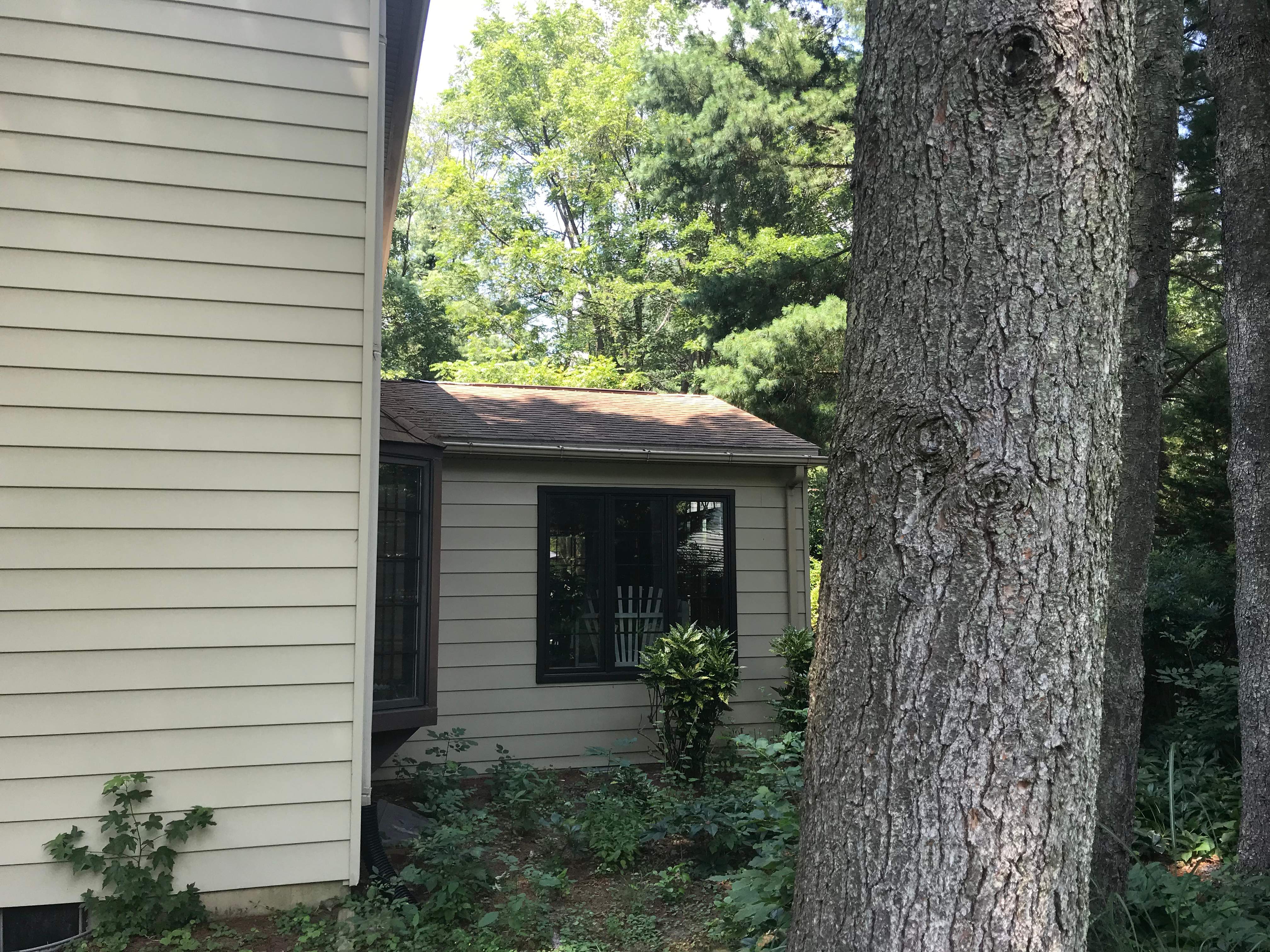 Residential Roofing Installation using Landmark Shingles Color Weatherwood by Alpha Design Services