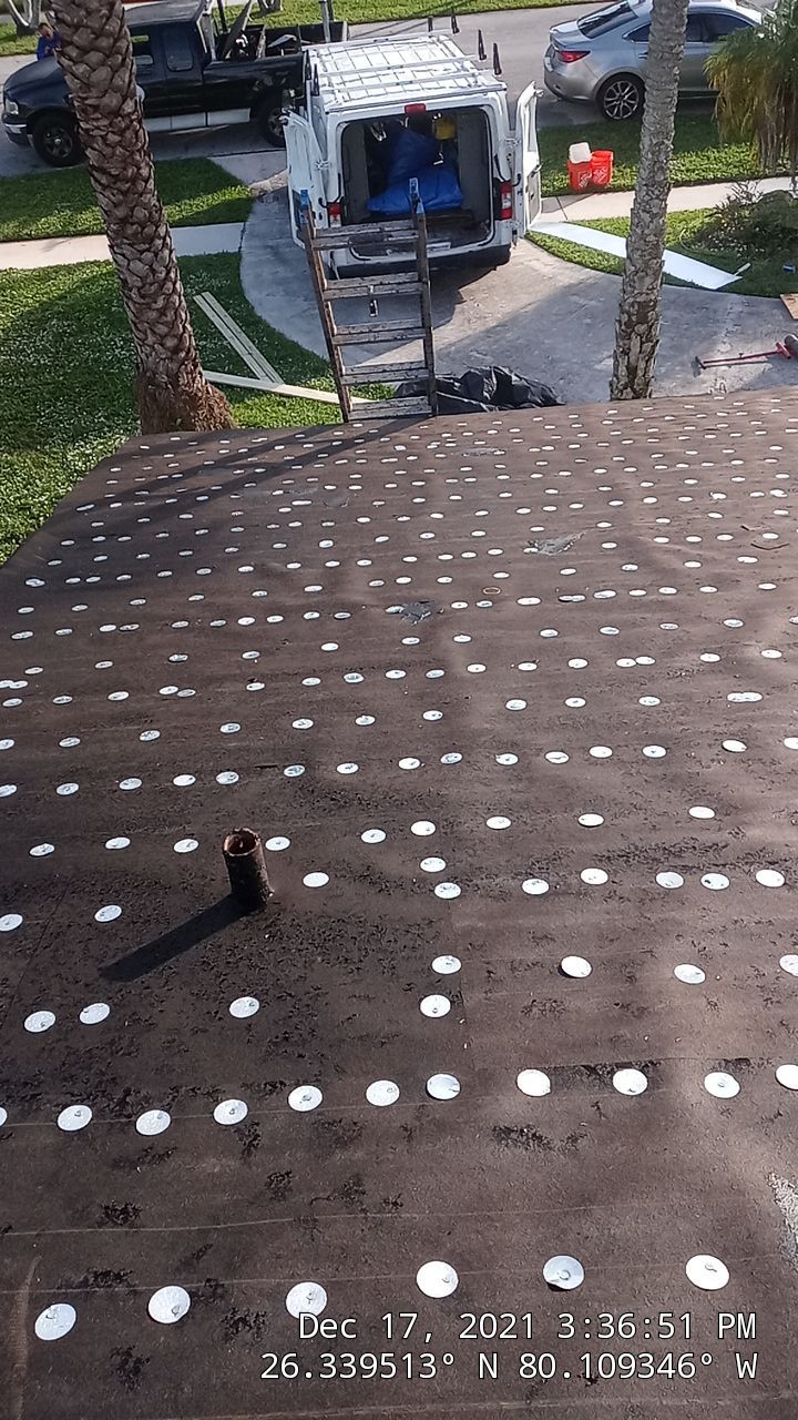 Residential Roofing Installation using 1" Nail strip metal roof by BLUES BROTHERS ROOFING