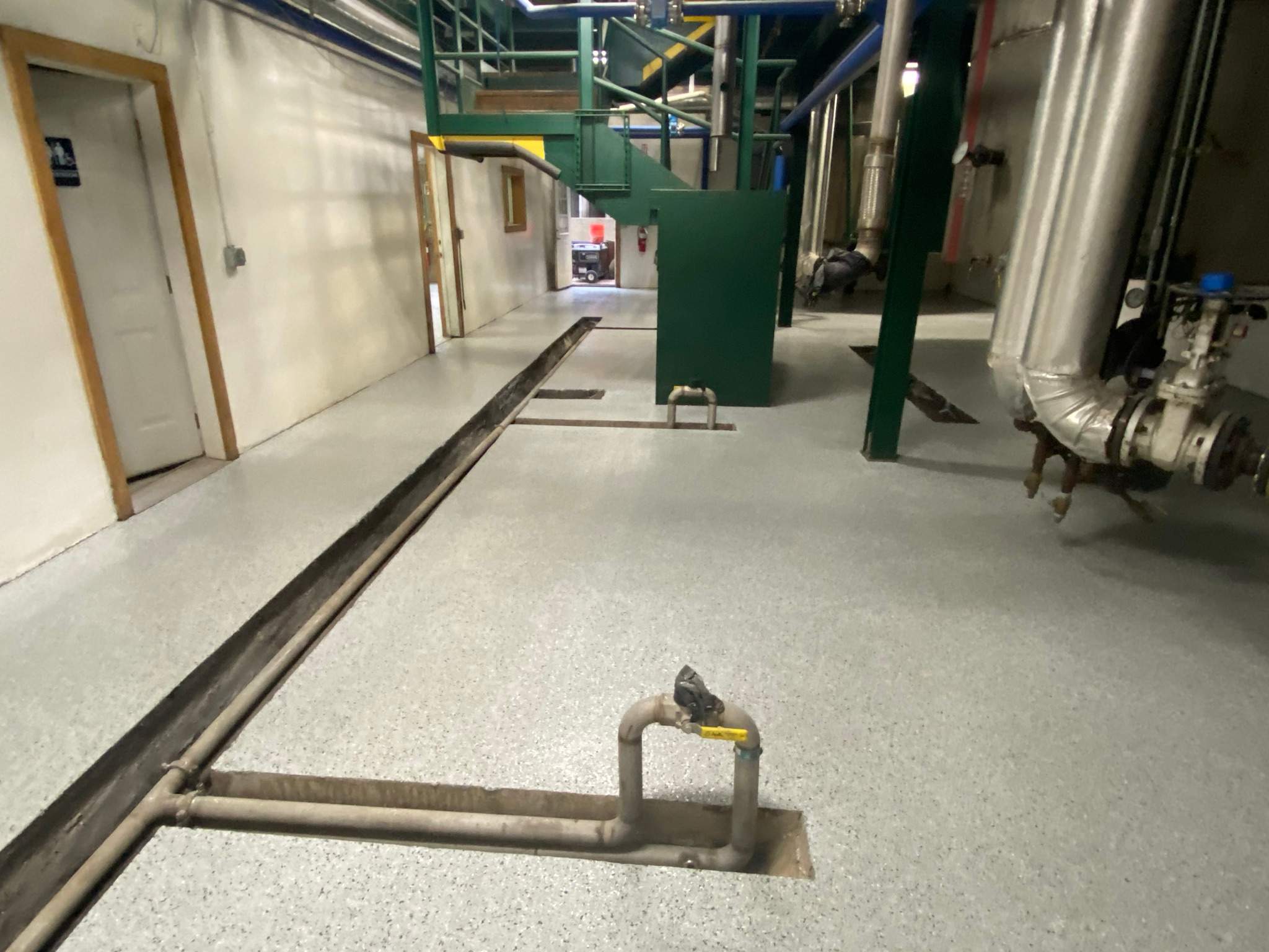 Commercial Floor Transformation using North Pole with Green by Croc Coatings, LLC