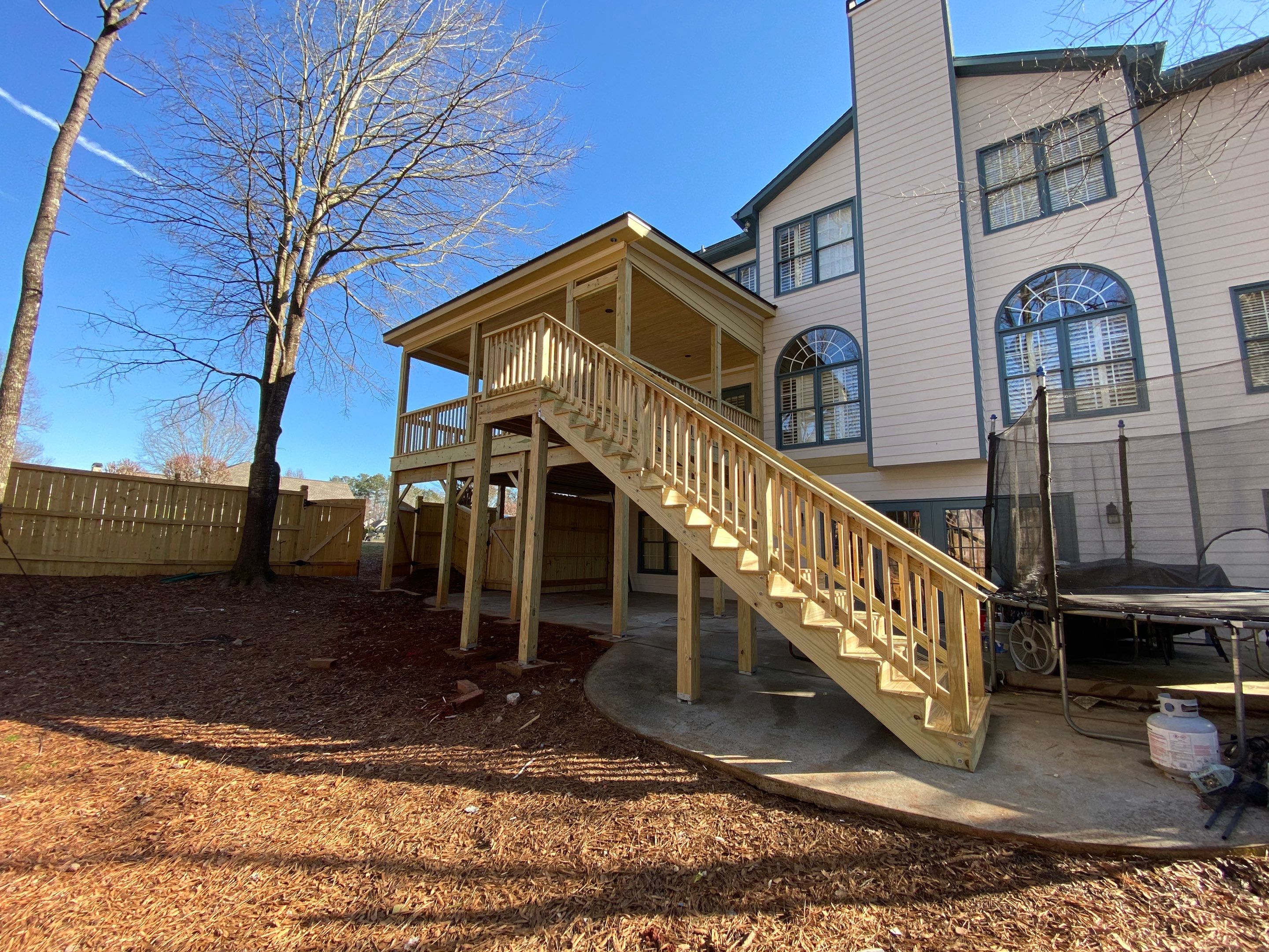 Covered Porch Addition and Custom Privacy Fence Installation in Alpharetta by Swift Home Renovations