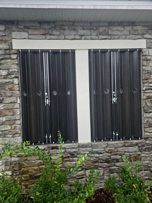 Accordion Shutters with Port Holes