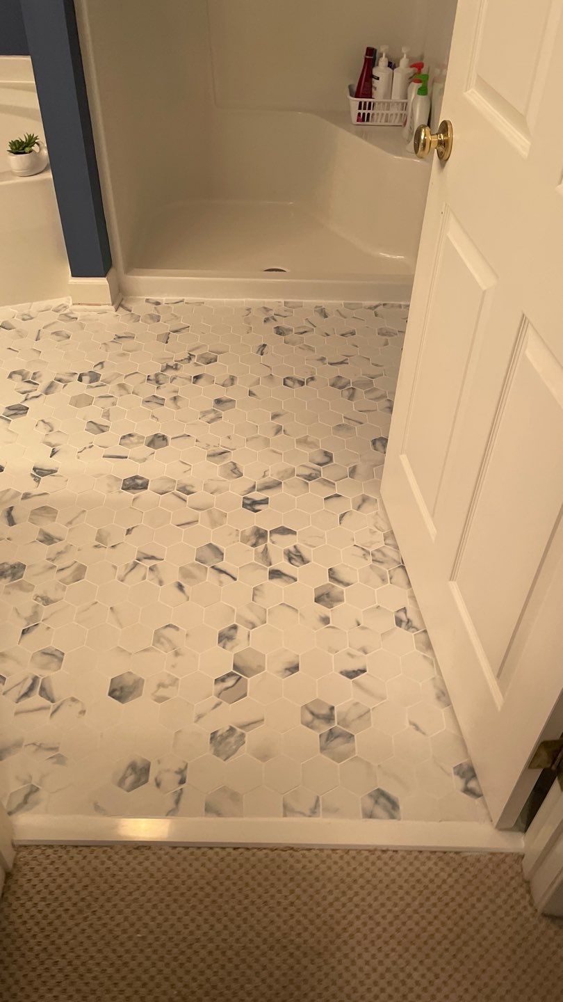 Bathroom Remodel using Tile by Footprints Floors of Coastal Carolina