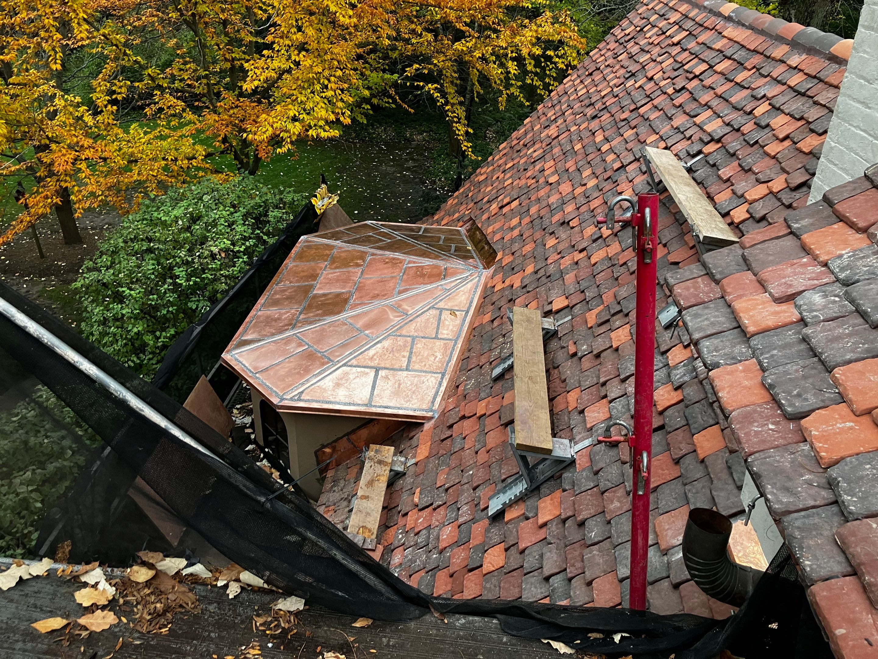 Ludowici Roof Installment and Half Round Copper Gutter Replacement  by Custom Installations