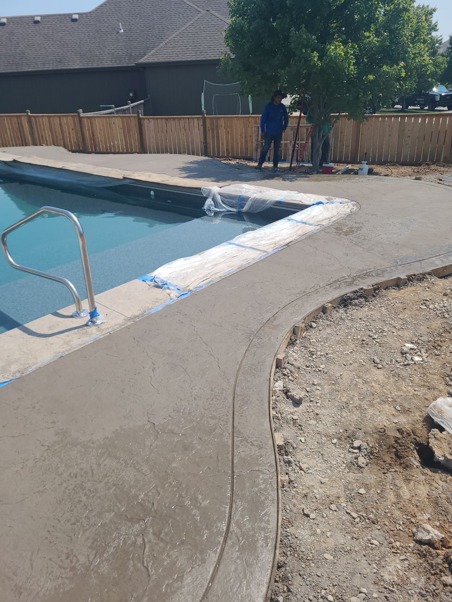Back Yard Pool Patio by LAND ESCAPES LLC