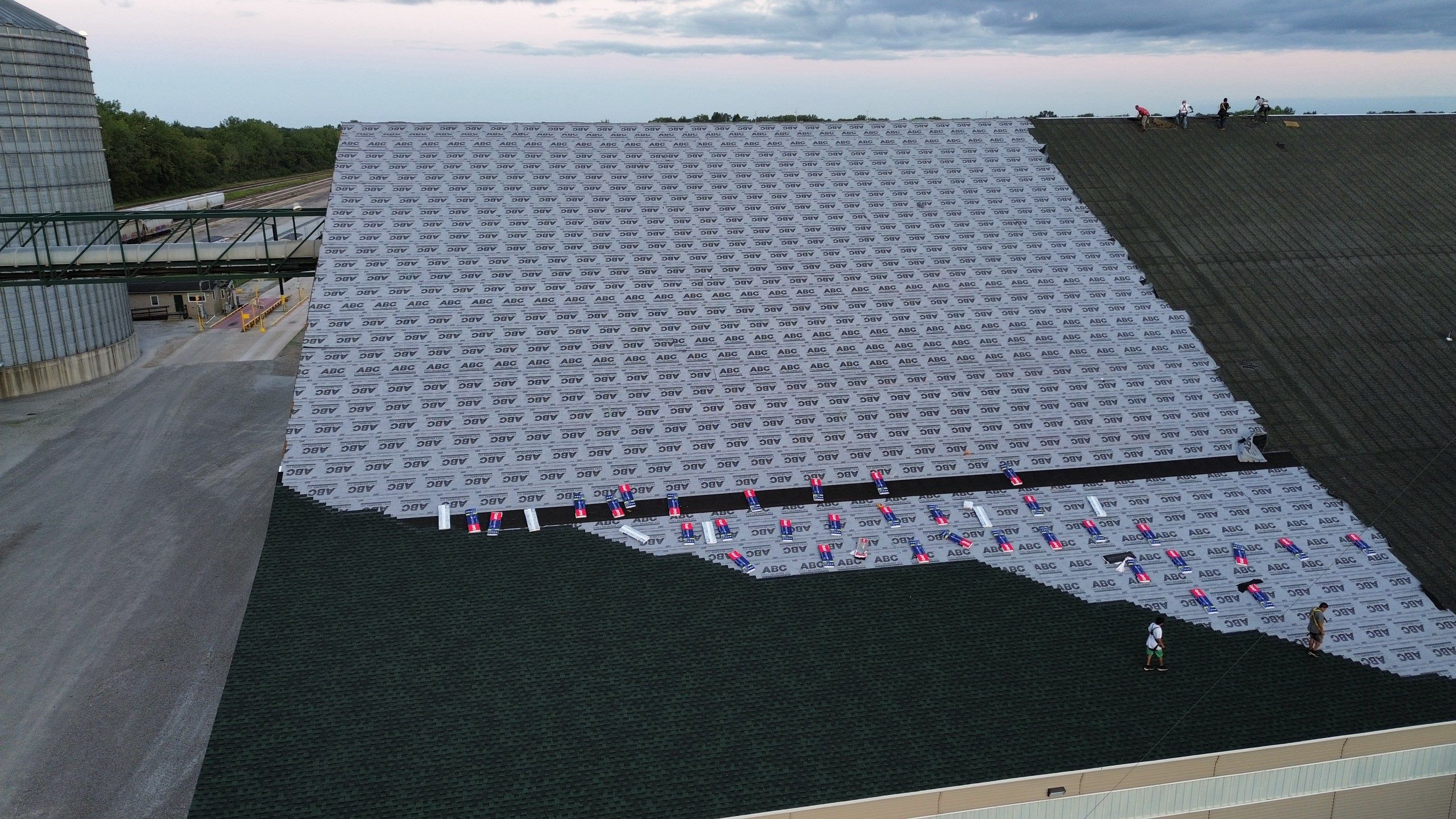 Commercial Roofing Installation using Timberline HDZ Shingles - Hunter Green by RoofX 