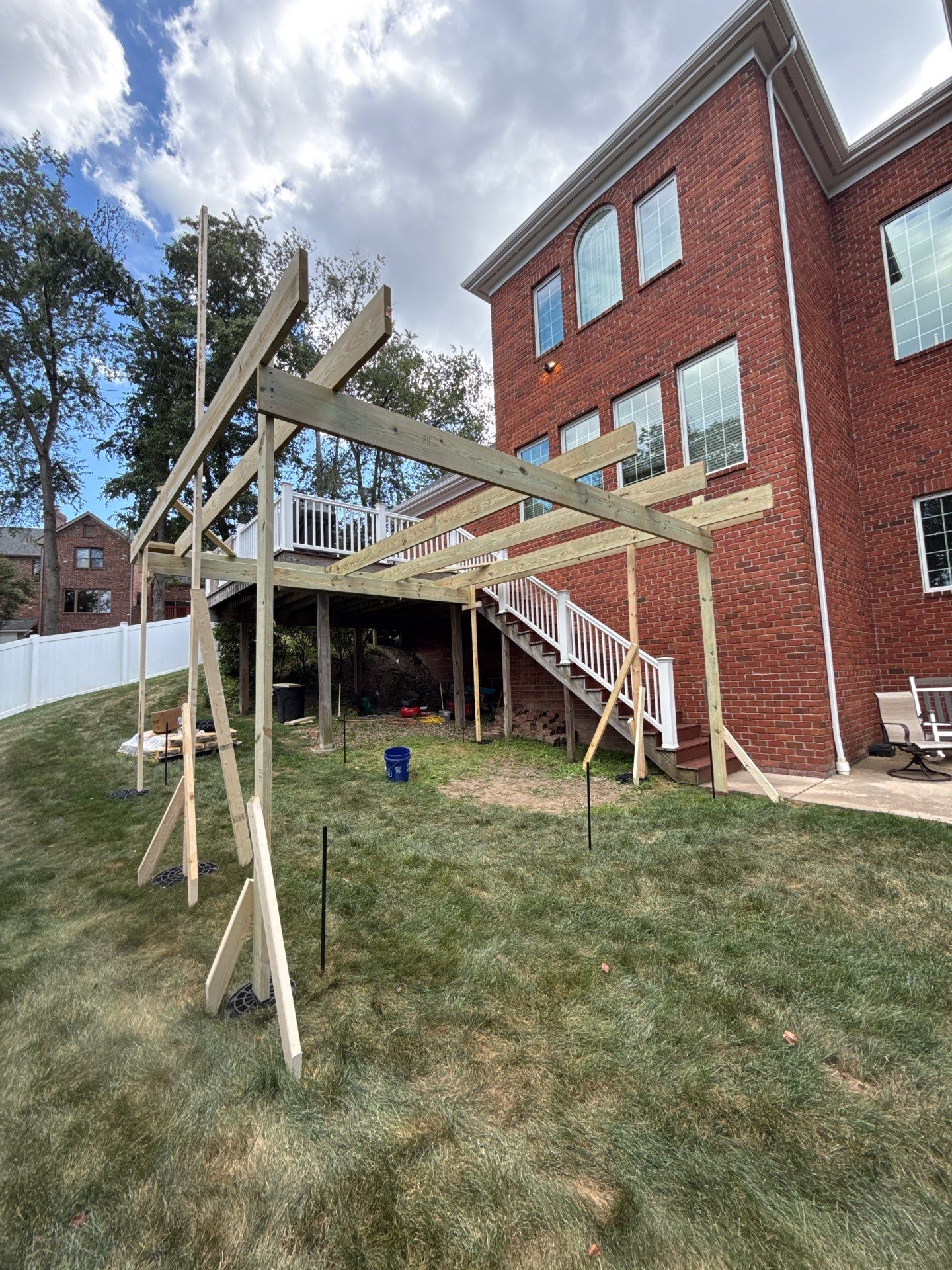 Deck extension  by Cousins Roofing Siding & Decks